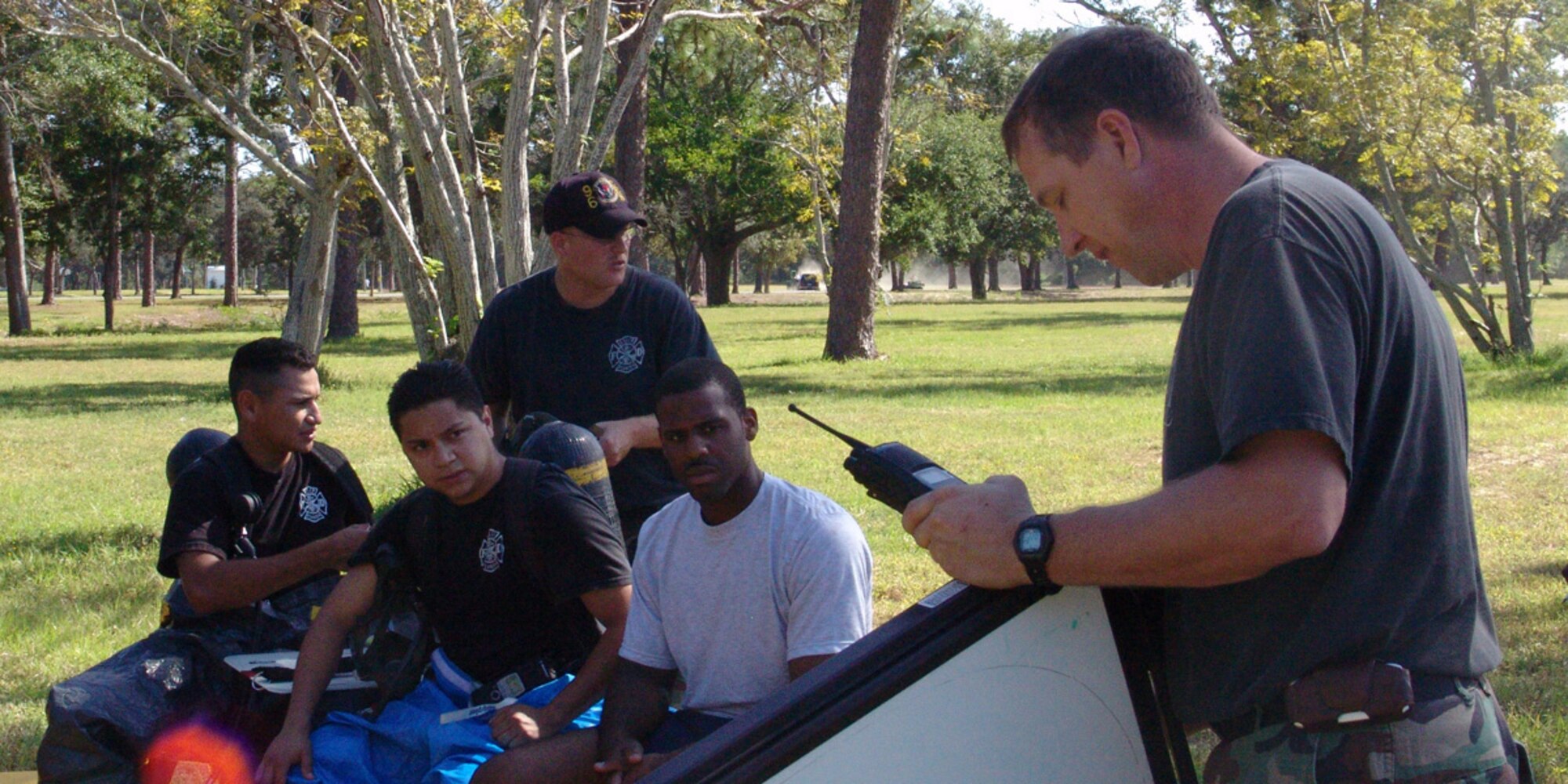 Tech Sgt. Mardy Damm, 96th Civil Engineer Squadron, briefs first responders prior to suiting up for a hazardous material exercise.  Sergeant Damm was the incident commander for the exercise. The firefighters participated in a hazardous material training session taught by instructors with the Department of Defense's Fire Academy at Goodfellow AFB, Texas. (USAF photo by Lois Walsh)                            