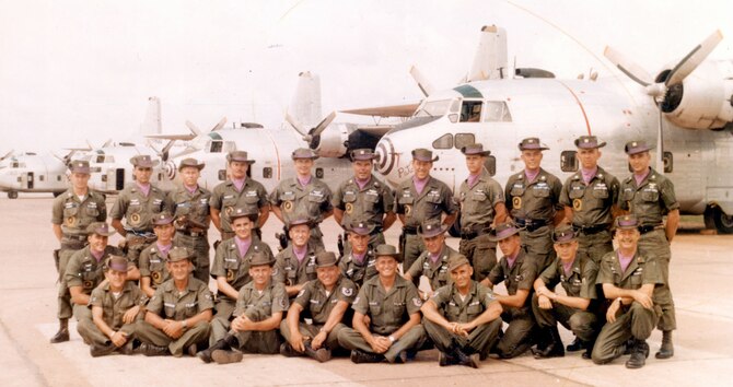 Members of Ranch Hand in 1964/1965, at a time when the program had only four C-123s. The aircraft on the right is the museum’s Patches. (U.S. Air Force photo)