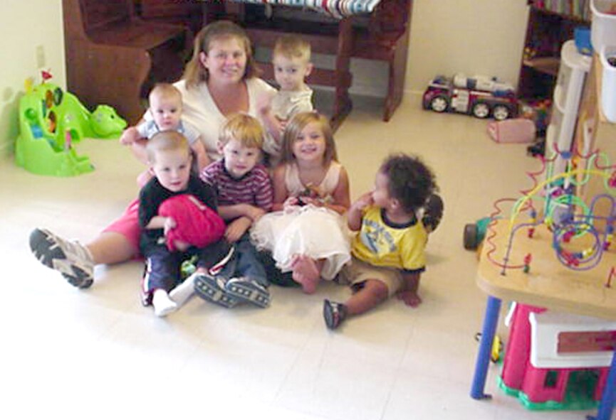 CANNON AIR FORCE BASE -- Angie Kosmicki is one of the Cannon's home daycare providers. Military members returning from extended deployments are eligible to receive up to 16 hours of free daycare. For more information, call 784-6560 or 784-7650 (Courtesy photo)