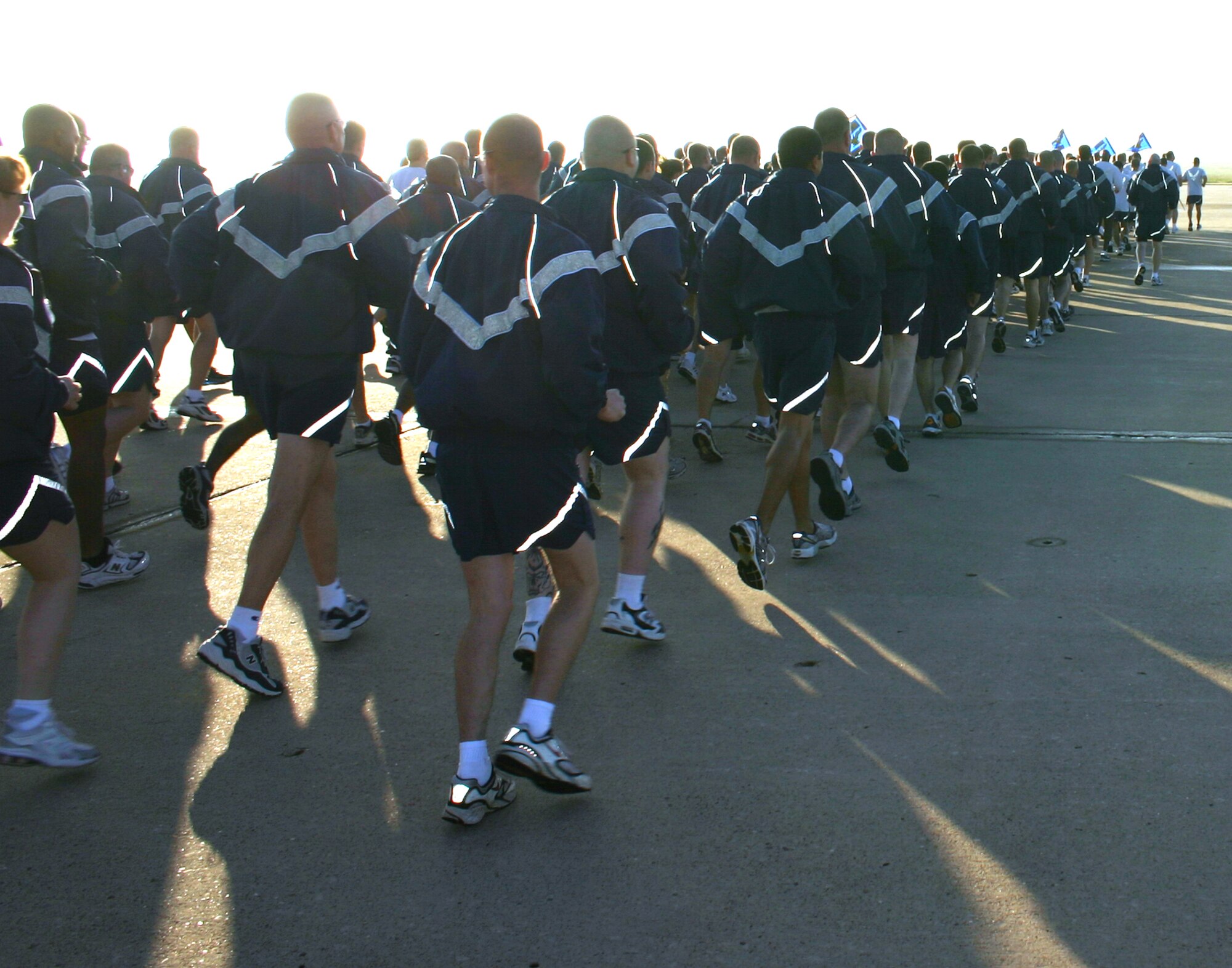 CANNON AIR FORCE BASE, N.M. -- Airmen begin their two-mile commando run on the base flightline Tuesday morning. Airmen from the 27th Special Operations Group and 27th Special Operations Maintenance Group participated in the run. (U.S. Air Force photo by Airman Elliott Sprehe)