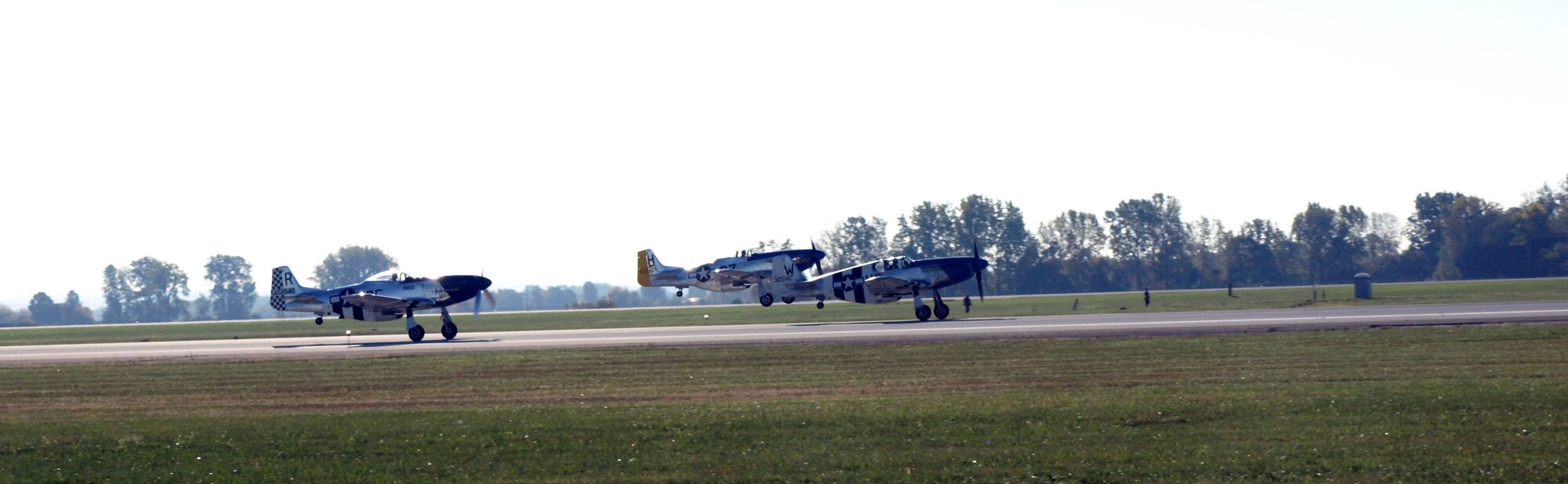 Three P-51 Mustangs take to the air at Rickenbacker International Airport Sept. 29. (Air Force photo by Ron Scharven)