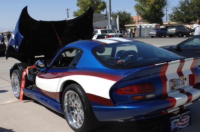 Individuals showcase their cars at the Autocross event Sept. 29 and 30, 2007 on Nellis AFB, Nev. The Autocross is a two day event that includes a fighter vs car race, a Mile Shoot Out, and a vehicle display.  
(Air Force Photo by Airman Stephanie Rubi)
