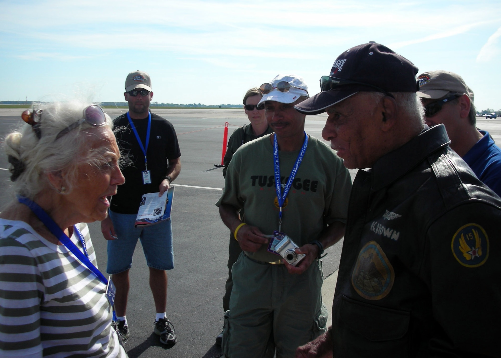 Roscoe C. Brown Jr., former commander of the Tuskegee Airmen, swaps stories with Betty Blake, one of the original Women Air Force Service Pilots (WASPs) September 30 at the Gathering of Mustangs and Legends air show held at Rickenbacker International Airport. (Air Force photo by 2nd. Lt. Erika Wonn)