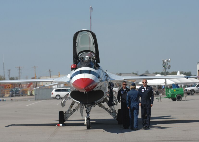 Major Samantha Weeks, Thunderbird pilot number six, prepares for flight at the Gathering of Mustangs and Legends air show held at Rickenbacker International Airport. (Air Force photo by Senior Airman Amanda Cain)
