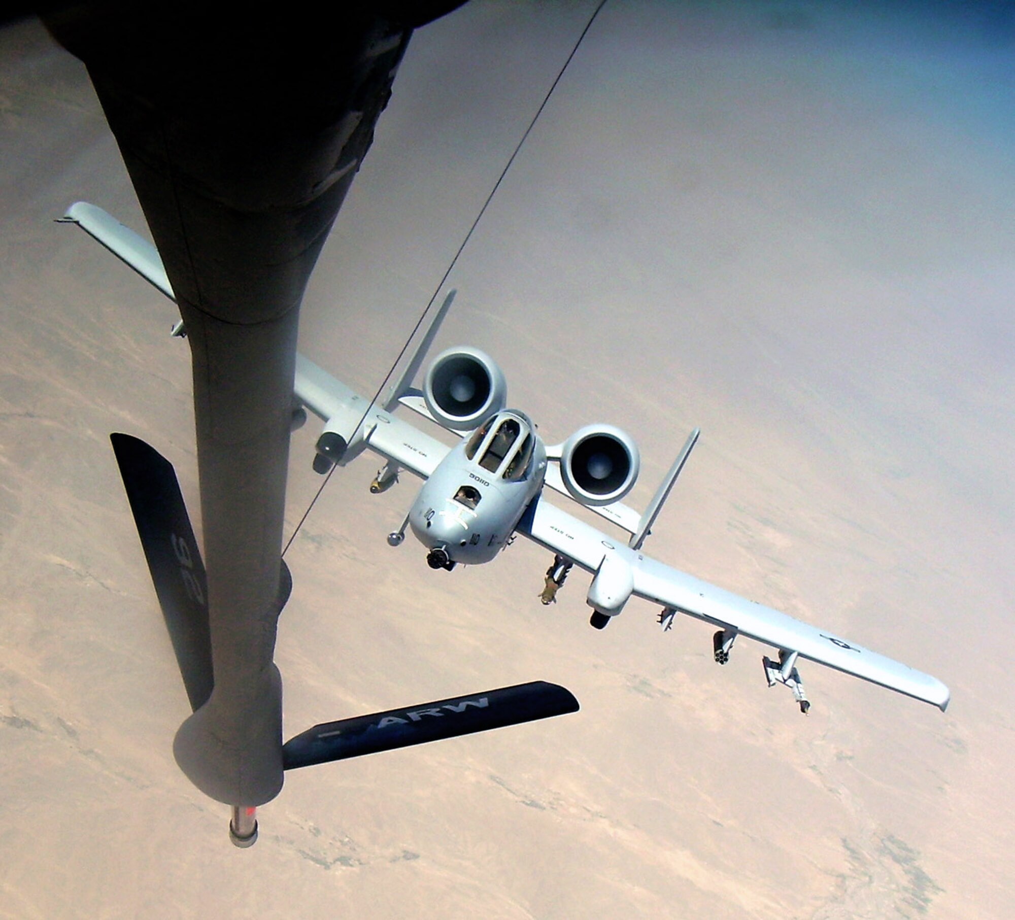 An A-10 Thunderbolt II moves into position behind a KC-135 Stratotanker on a combat mission over Afghanistan. The A-10 is deployed from the 442nd Fighter Wing, an Air Force Reserve unit based at Whiteman Air Force Base, Mo., to Bagram Airfield in support of Operation Enduring Freedom. (US Air Force photo/Lt. Col. Marcel Dionne)