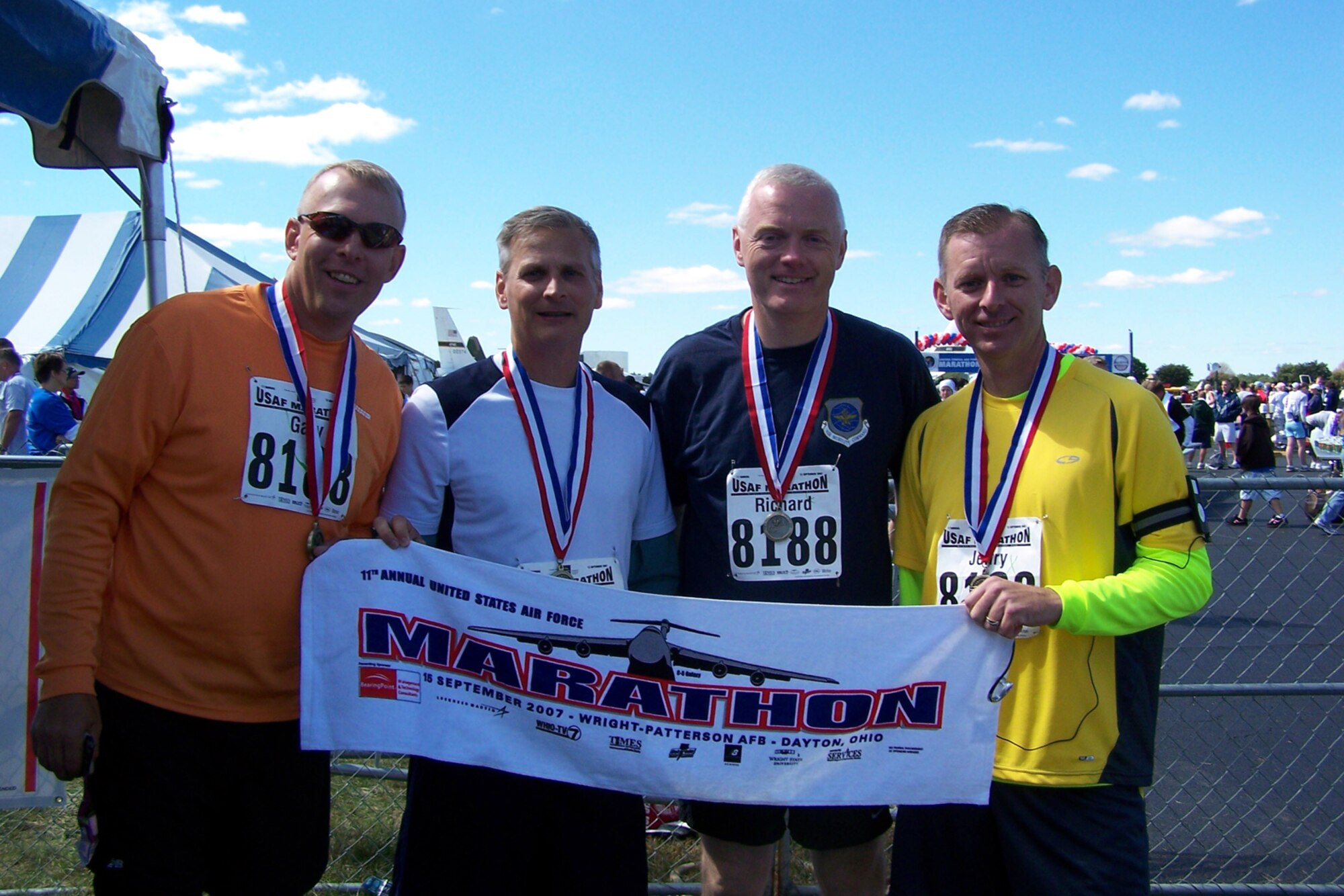 Left to right, Chief Master Sgt. Gary Holtgard, 21st Expeditionary Mobility Task Force command chief, Chief Master Sgt. Scott Kilbride, 305th Air Mobility Wing command chief, Chief Master Sgt. Andy Kaiser, 621st Contingency Response Wing command chief, and Chief Master Sgt. Jeff Helm, U.S. Air Force Expeditionary Center command chief, after participating in the 11th Annual U.S. Air Force Marathon at Wright Patterson Air Force Base, Ohio, Sept. 15. The command chiefs ran the relay race of the marathon with a total time of 4:07:43. They placed 131 of 253 participating teams. They participated to commemorate the Air Force’s 60th anniversary, to embrace teamwork and to share a common passion of being fit to fight. (U.S. Air Force courtesy photo)