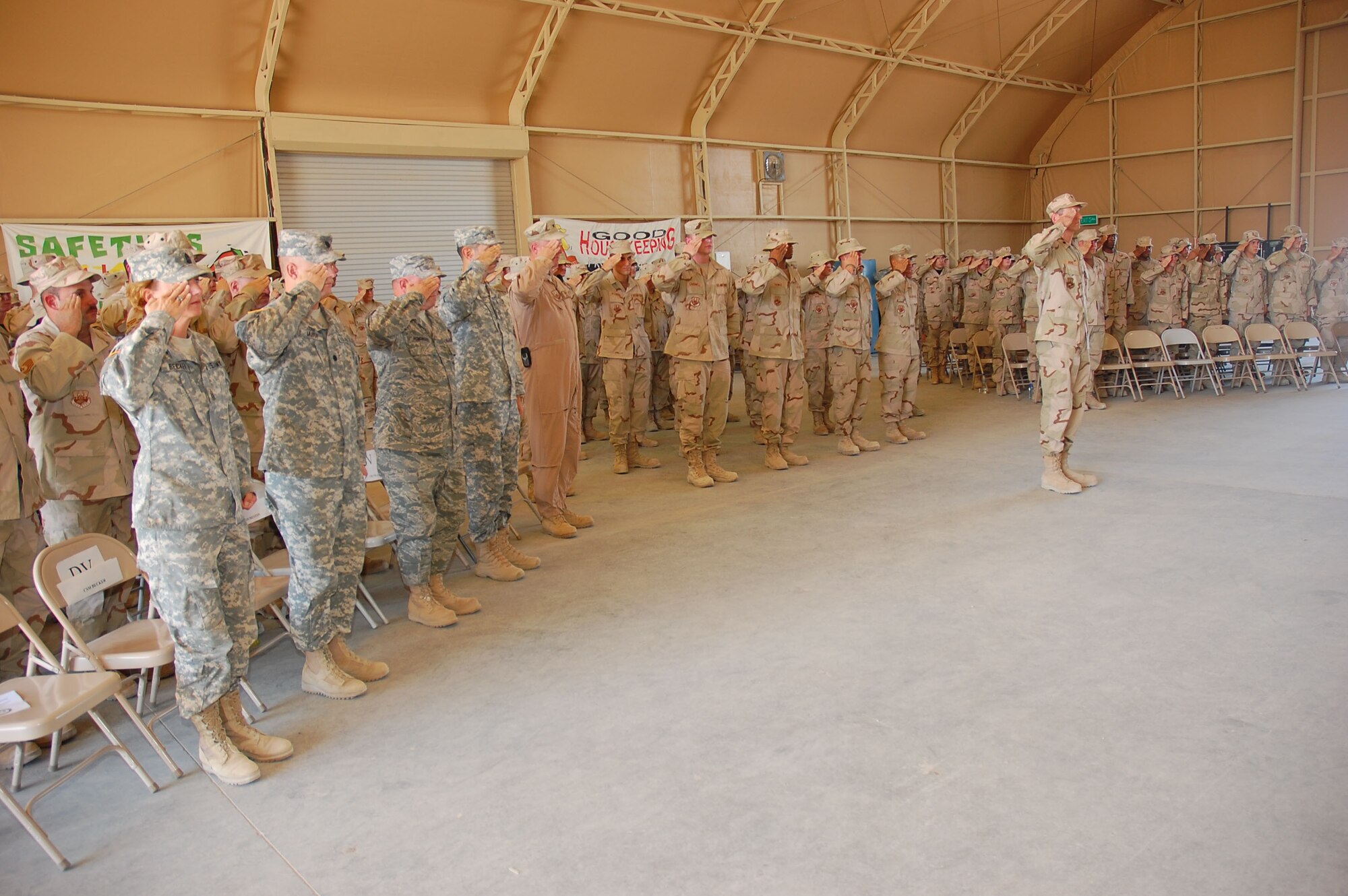 SOUTHWEST ASIA -- 586th Expeditionary Logistics Readiness Squadron change of command. Lt. Col. Kevin Sampels assumed command of the squadron from Lt. Col. Daryl Cunningham at an undisclosed location Sept. 28. (U.S. Air Force photo by Staff Sgt. Tia Schroeder)