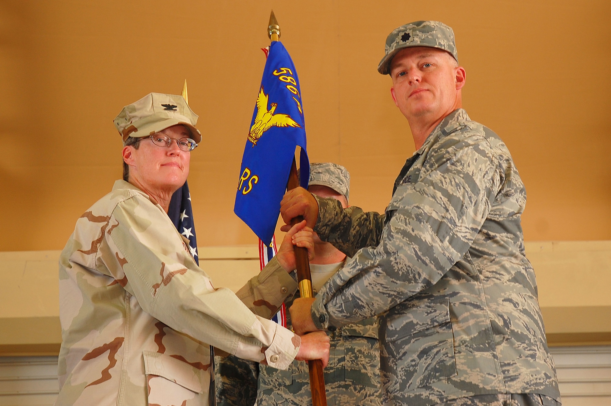 SOUTHWEST ASIA -- 586th Expeditionary Logistics Readiness Squadron change of command. Lt. Col. Kevin Sampels assumed command of the squadron from Lt. Col. Daryl Cunningham at an undisclosed location Sept. 28. (U.S. Air Force photo by Staff Sgt. Tia Schroeder)