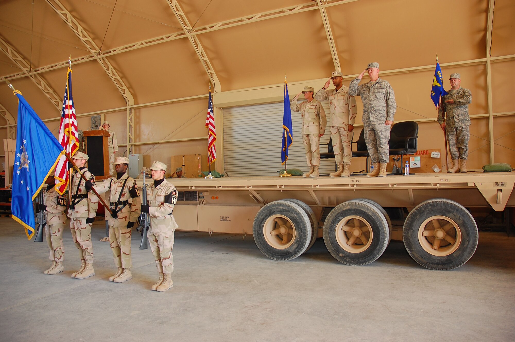 SOUTHWEST ASIA -- 586th Expeditionary Logistics Readiness Squadron change of command. Lt. Col. Kevin Sampels assumed command of the squadron from Lt. Col. Daryl Cunningham at an undisclosed location Sept. 28. (U.S. Air Force photo by Staff Sgt. Tia Schroeder)