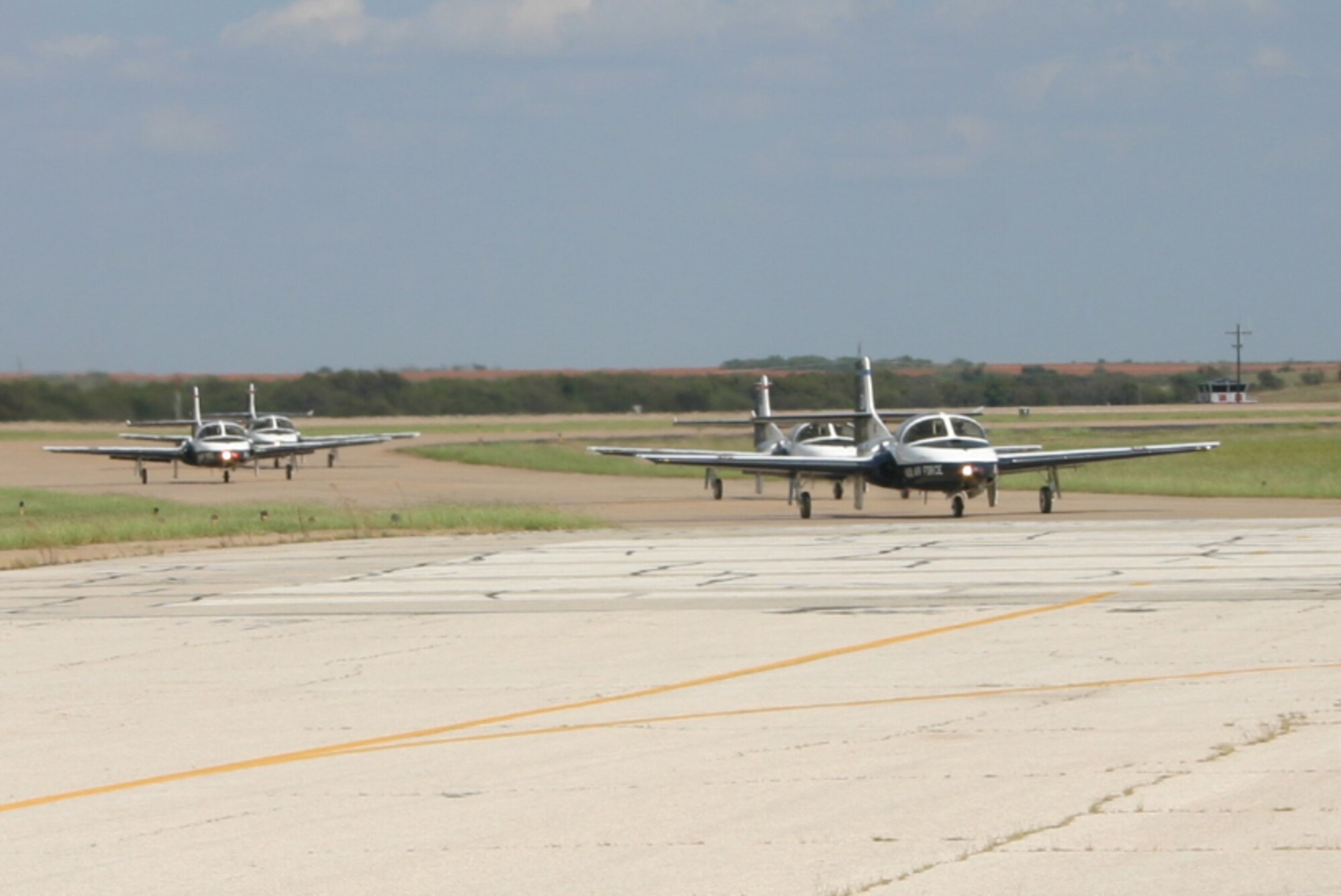 The T-37 Tweets designated to perform a four-ship formation prepare to take off Oct. 2.  This will be the last such formation flight at Sheppard for the T-37 Tweet as the transition to the T-6 Texan begins in 2008. (U.S. Air Force photo/Staff Sgt. Tonnette Thompson)