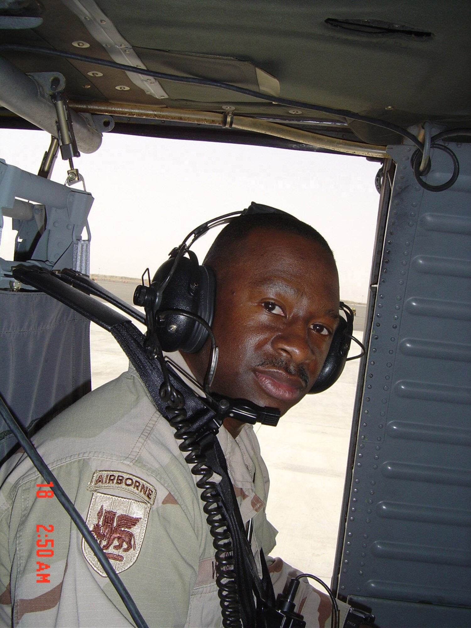Lt. Col. Cedric Wilson travels through the skies of Kuwait in a UH-60 Blackhawk to brief the director of Defense Contract Management Agency of on-going operations in Afghanistan.                               