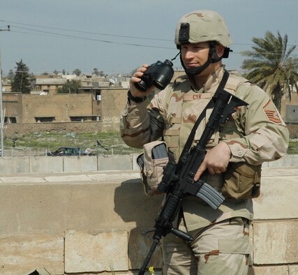 Master Sgt. Paul Cyr, 506th Expeditionary Security Forces Squadron, keeps a vigilant eye at Kirkuk Regional Air Base, Iraq. Sergeant Cyr recently deployed from Westover to Kirkuk in support of Operation Iraqi Freedom. (U.S. Air Force photo/Tech. Sgt. Kevin Williams)
