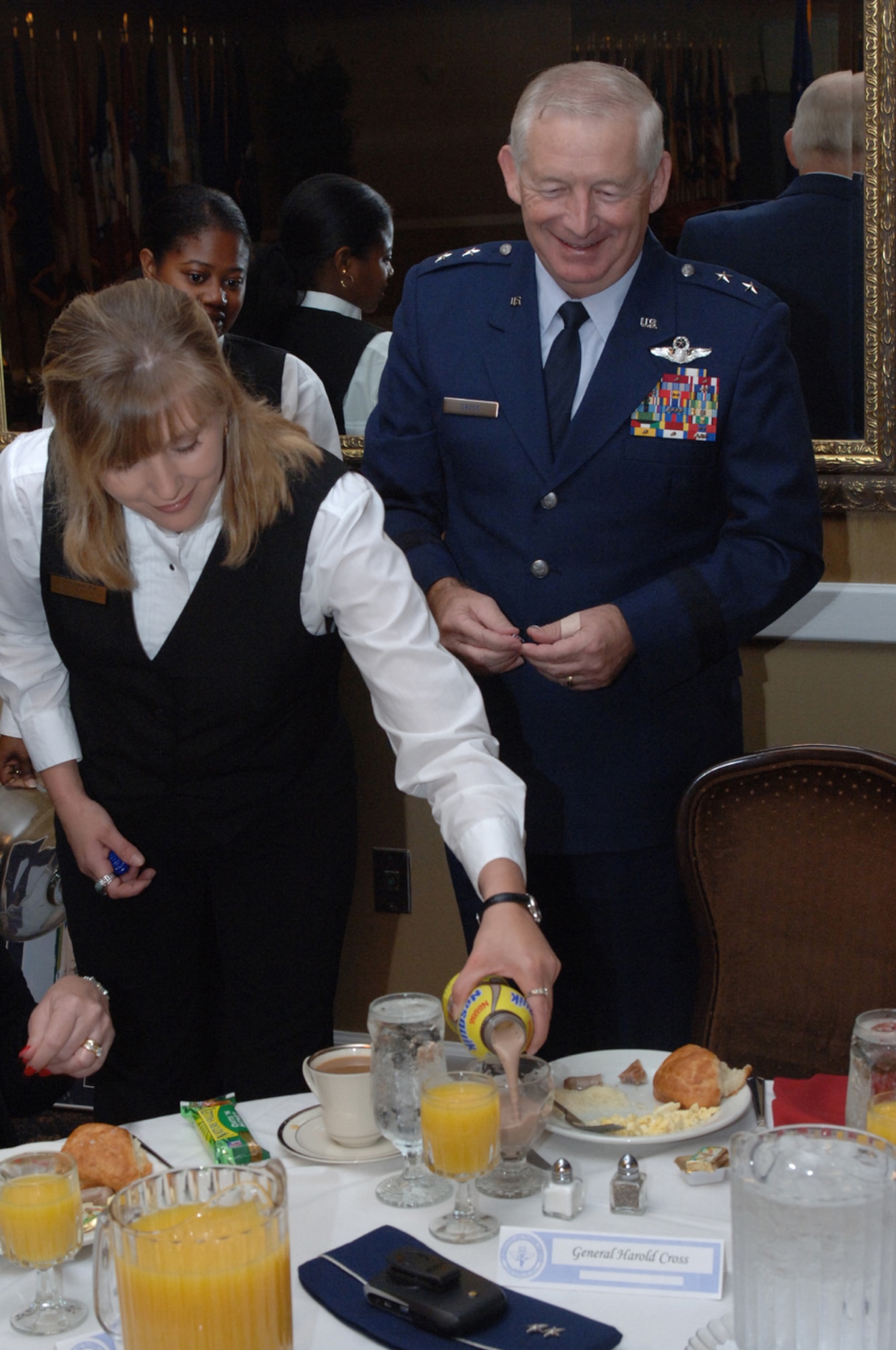Maj. Gen. Harold Cross, Adjutant General of Mississippi, receives his a special birthday breakfast from Mary Brock, 14th Services Division, during the graduation breakfast Friday morning. General Cross was the keynote speaker for Specialized Undergraduate Pilot Training class 07-15 graduation. (U.S. Air Force photo by Senior Airman John Parie)