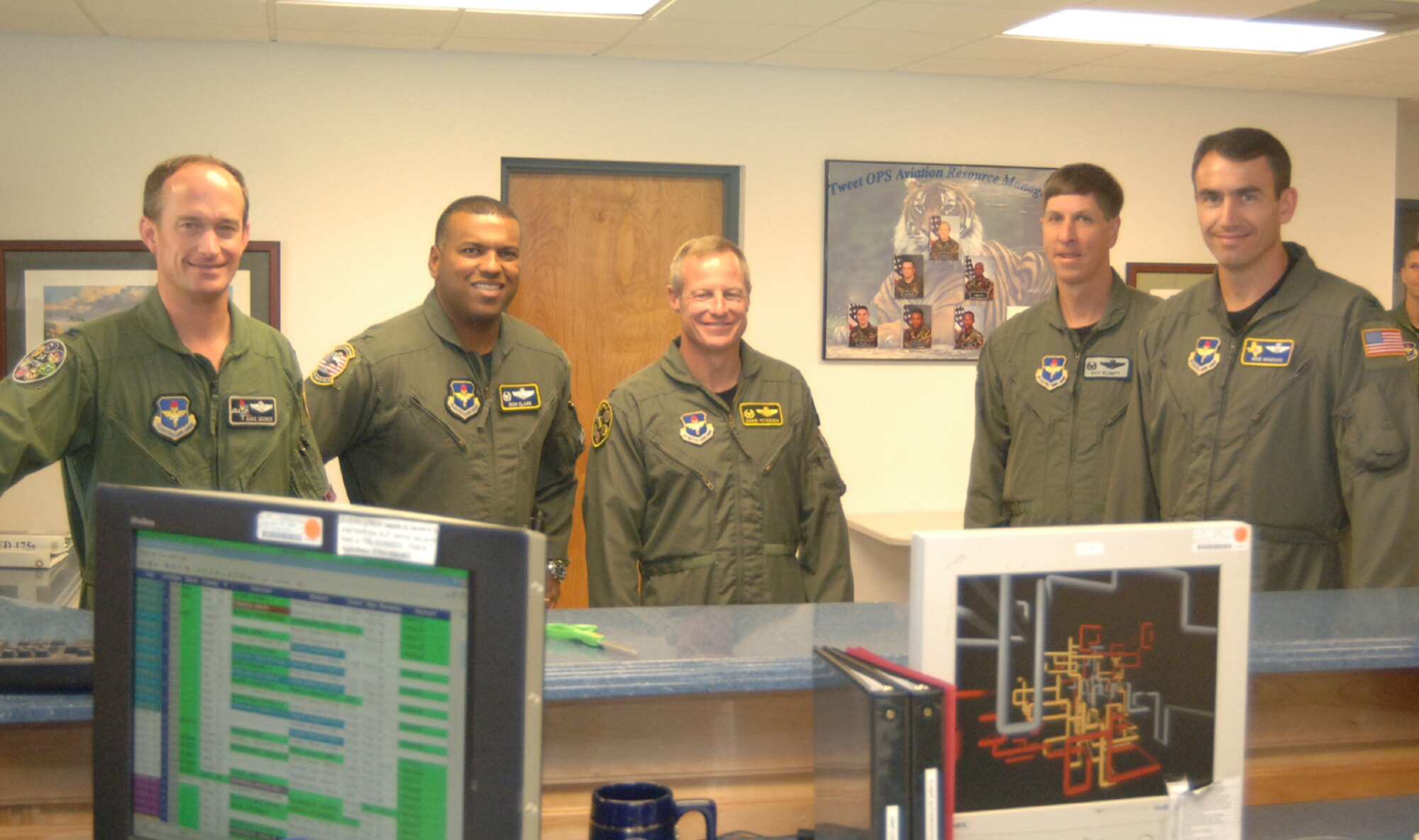 Four wing commanders visited Columbus AFB Monday through Wednesday for a Specialized Undergraduate Pilot Training commander's summit hosted by Col. Dave Gerber, 14th Flying Training Wing commander. Pictured here are: (left) Col. Gerber, Col. Richard Clark, Randolph AFB commander, Col. David Petersen, Sheppard AFB commander, Col. Richard Klumpp, Vance AFB commander, and Col. Mike Minahan, Laughlin AFB commander. (U.S. Air Force photo by Airman 1st Class Danielle Powell)