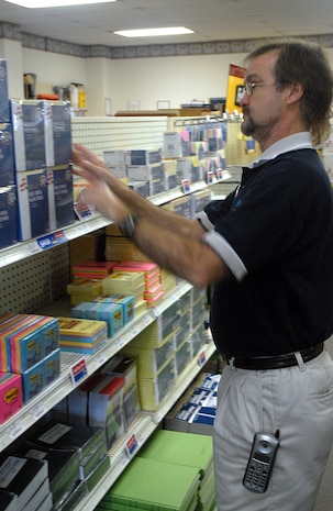 Leon Baldwin, assistant manager of the Base Supply Center Charleston, stocks blind-made products in building 713 on Charleston AFB Tuesday.  Mr. Baldwin is legally blind from Diabetic Retinopathy and has been employed at the base supply center since 2004. (U.S. Air Force photo/Airman Melissa White)