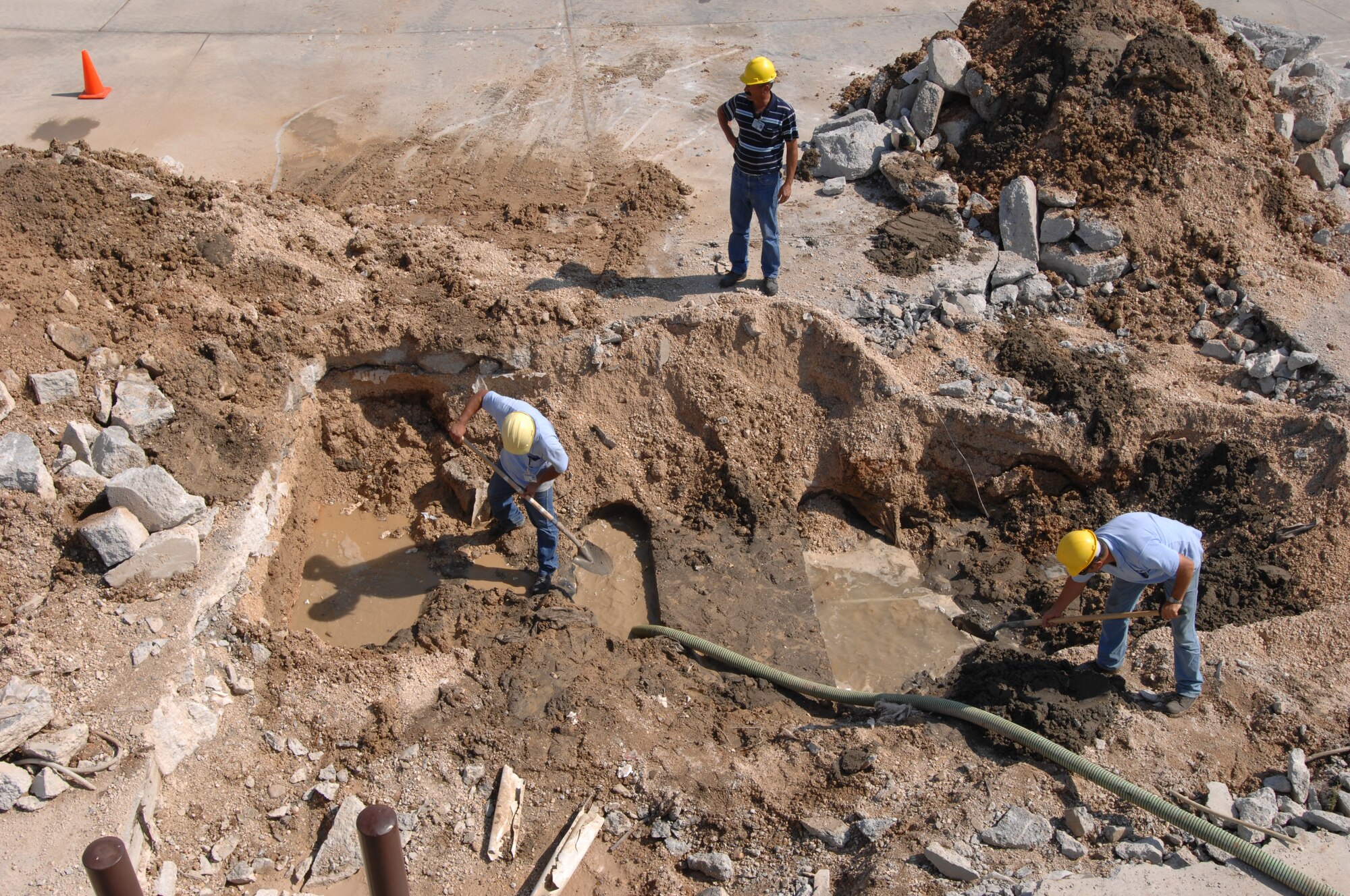 Members from the 39th Civil Engineer Squadron structures shop, repair a broken water pipe near the flight line Sept. 25. On average, the 14-members of the structures shop receive 15 to 20 reports per month. Every report must be assessed based on amount of damage and repair work is done in order of severity.  (U.S. Air Force Photo by Airman 1st Class Timothy Taylor)