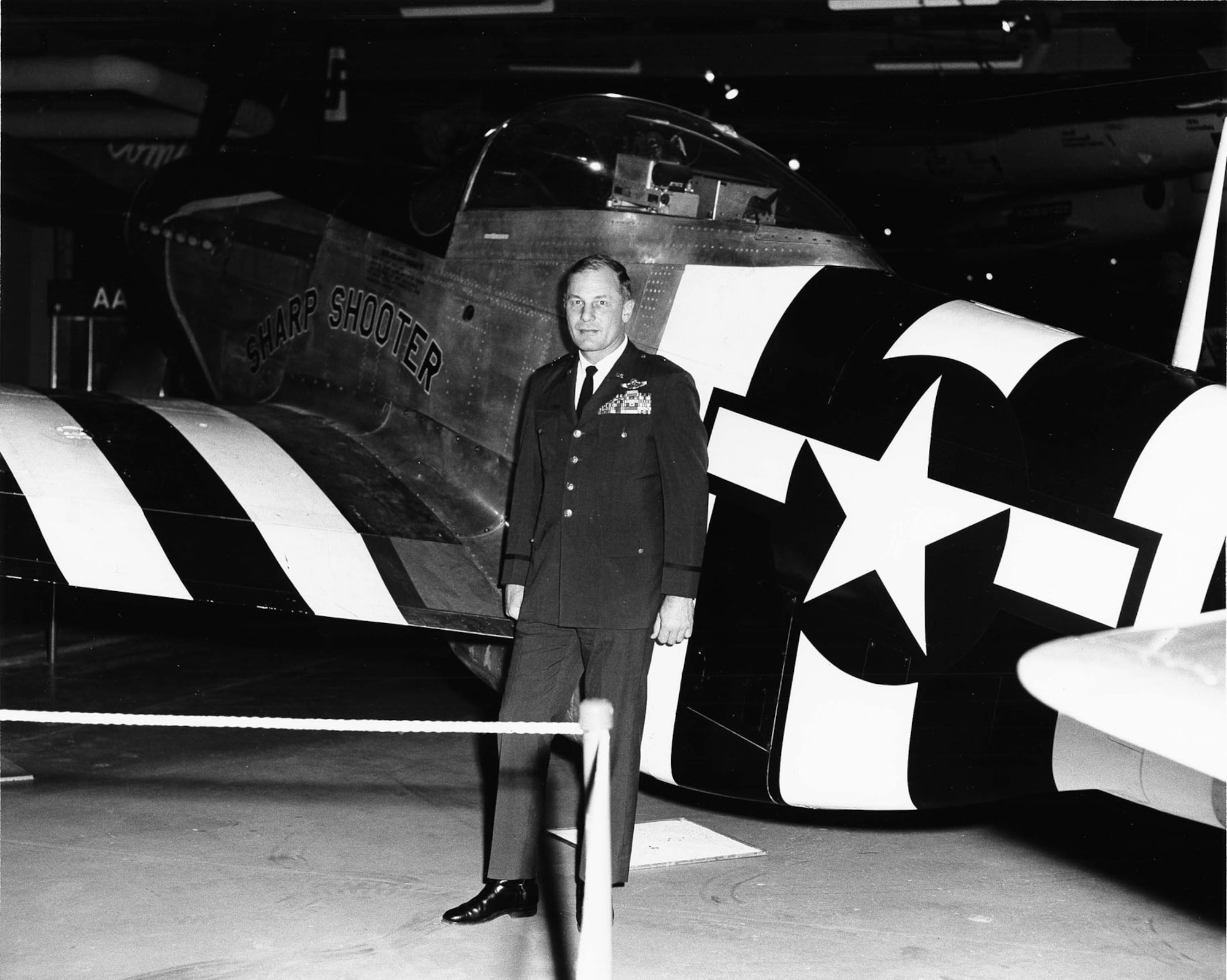 Robin Olds with the P-51D "Sharp Shooter" at the U.S. Air Force Museum. (U.S. Air Force photo)