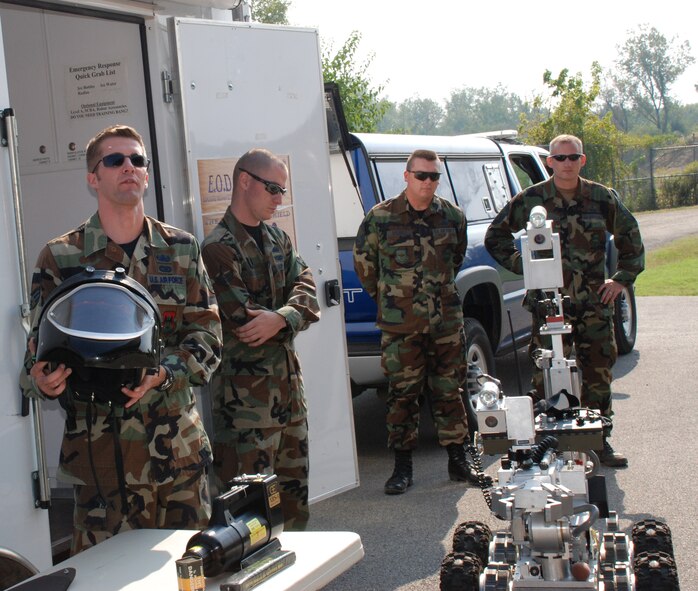 This is an explosive ordnance disposal (EOD) protective helmet and robot.  Boss Day 2007 at the 932nd Airlift Wing gave civilian employers of 932nd Airlift Wing Reservists a chance to see EOD military life behind the scenes, and push a few explosive buttons.  The explosive ordnance disposal team set up an extensive and popular demonstration for the visitors.  The commander and staff members gave briefings and a base tour was included.  Photo/Tech Sgt. Gerald Sonnenberg