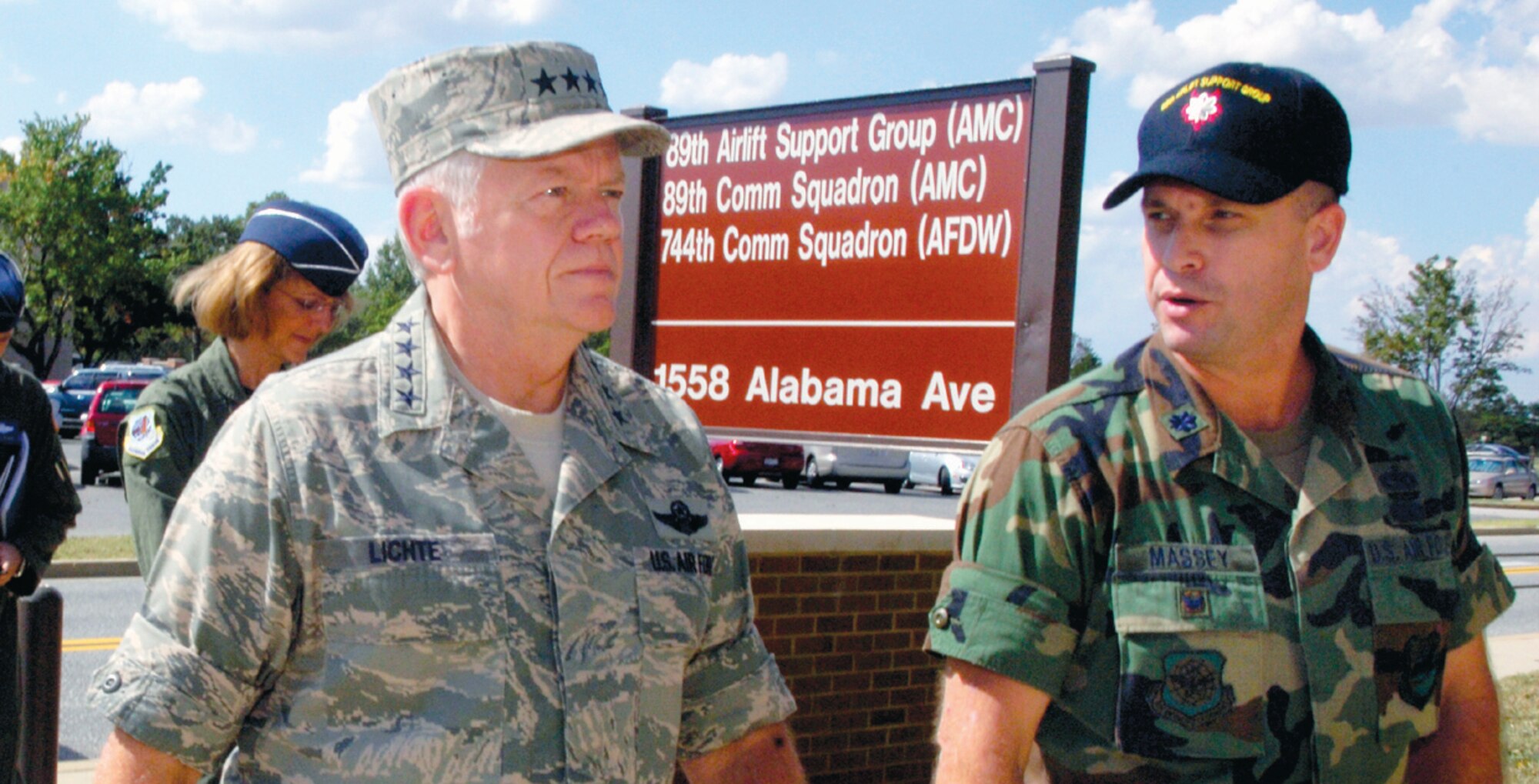 Lt. Col. Max Massey, 89th Airlift Support Group deputy commander, talks with Gen. Arthur Lichte, commander, Air Mobility Command, on the tour of the 89th Airlift Wing, Sept. 28. (US Air Force/A1C Renae Kleckner)