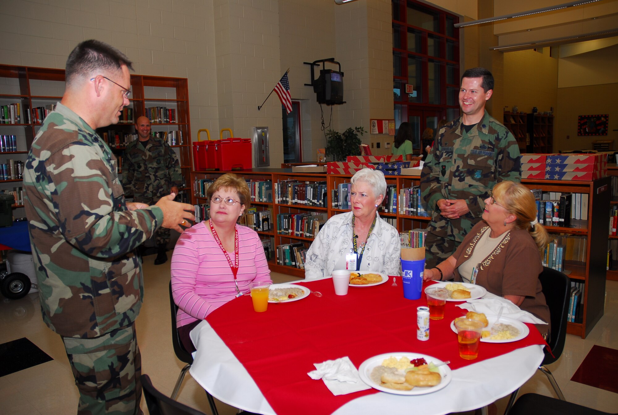 Standing, Lt. Col. Steven Ramsay ,left, 332nd Training Squadron and Lt. Col. Paul Valenzuela, 81st Mission Support Squadron.  Sitting, Pamela Rosetti, left, teacher of family and consumer science, Carol Walters, Math teacher, and Carol Newman, transition coordinator for special education students.  Biloxi High School, attended by many Keesler students, was one of four schools recognized by the U.S. Department of Education as Blue Ribbon Schools.  Blue Ribbon Schools are noted for their academic superiority or demonstrate dramatic gains in student achievement.  (U.S. Air Force photo by Kemberly Groue)

 

 

