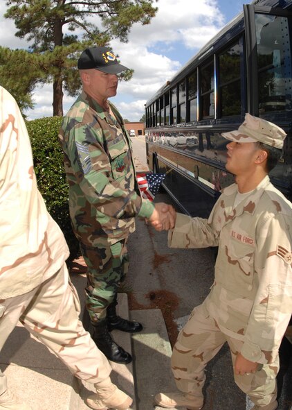SEYMOUR JOHNSON AIR FORCE BASE, N.C. - Cheif Master Sgt. Layton Clark, 4th Fighter Wing comand chief, welcomes home members of Team Seymour as they return from their deployment, October 1. (U.S. Air Force photo by Airman 1st Class Greg Biondo)