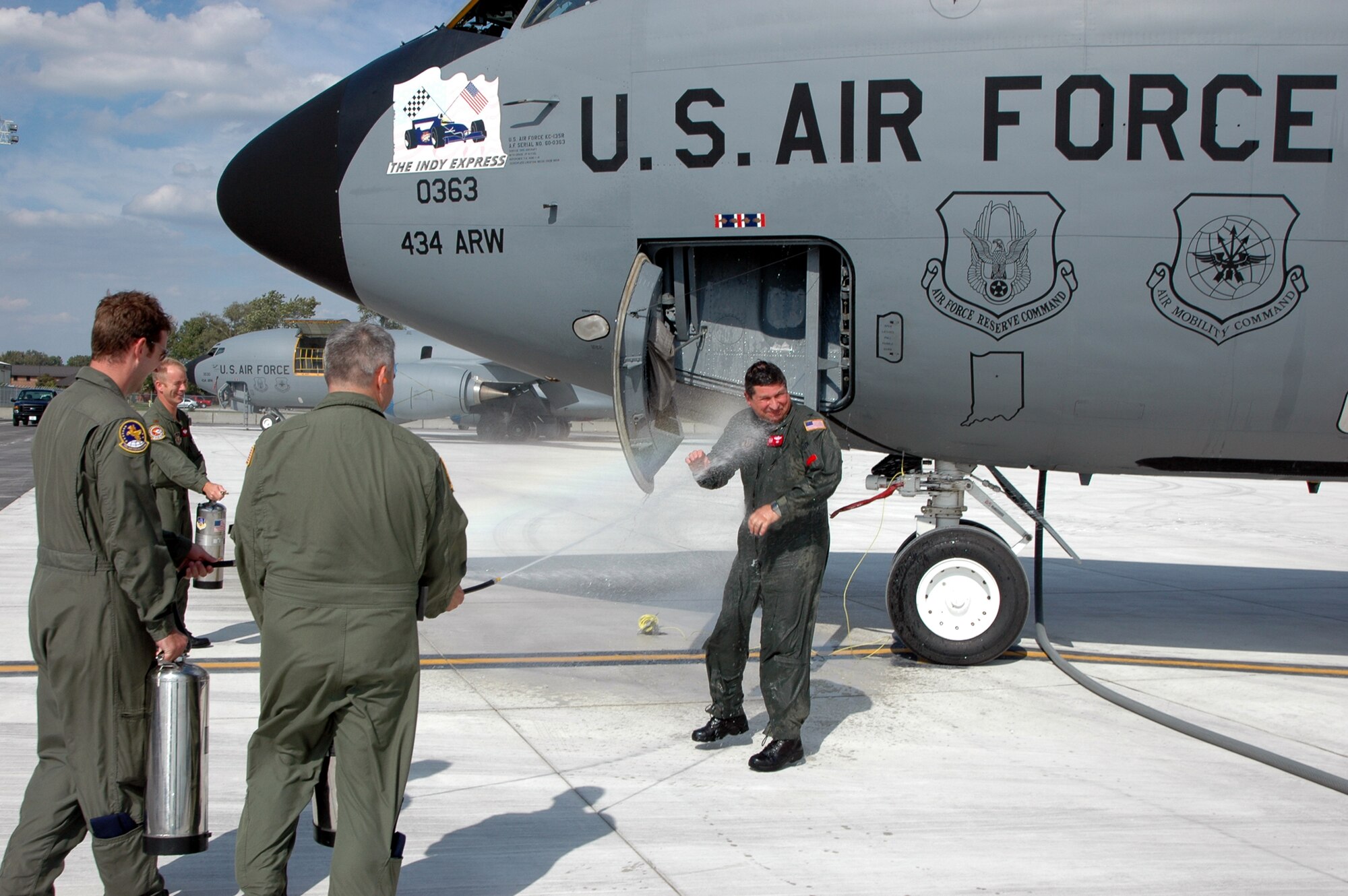 GRISSOM AIR RESERVE BASE, Ind., -- Col. Brian Dobbert, deputy commander of the 434th Operations Group, is hosed down by fellow aircrew members after completing his last flight with the 434th Air Refueling Wing. (U.S. Air Force photo/ SrA Carl Berry)