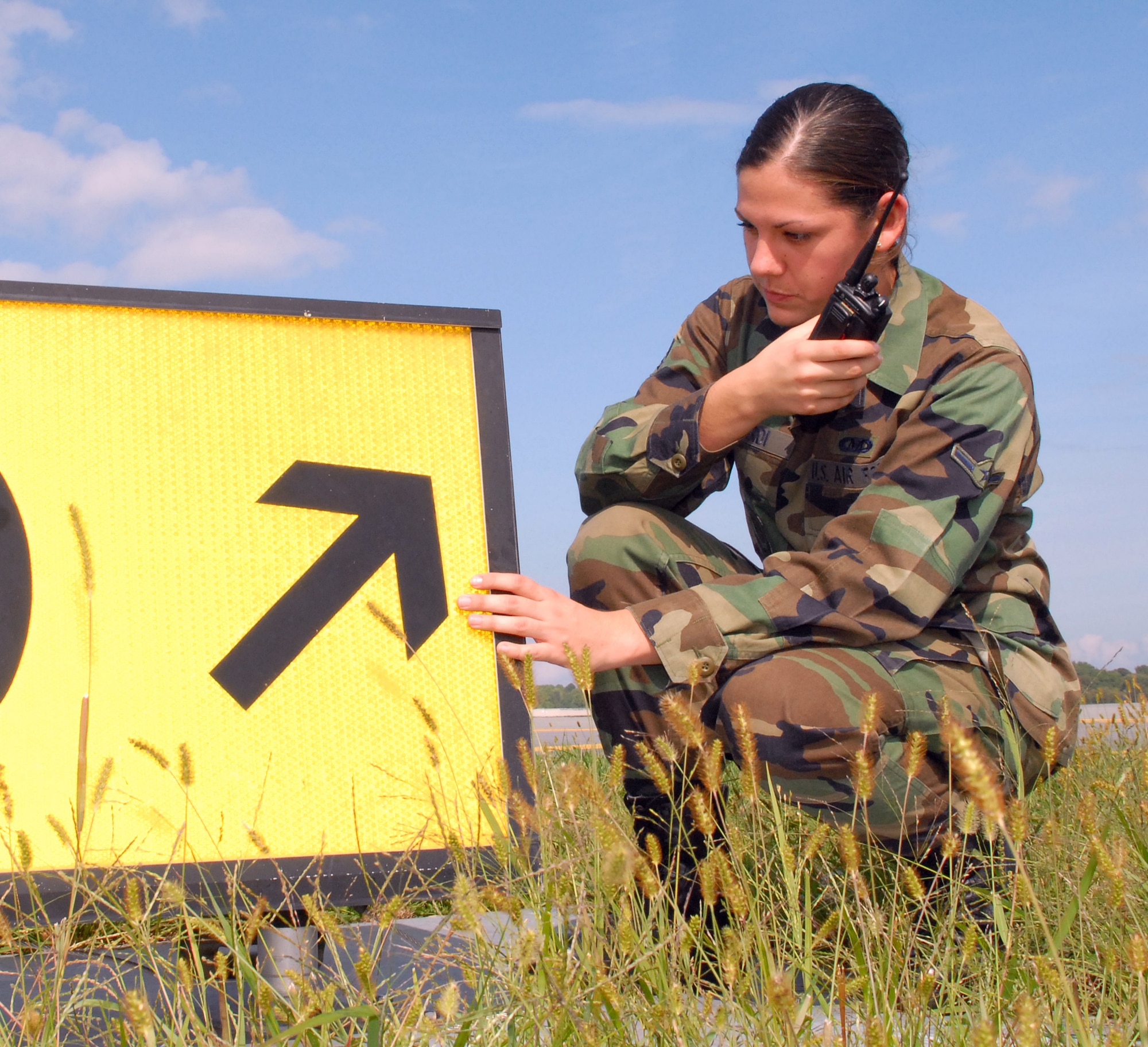 Airman Jamiel Girardi, 436th Operations Support Squadron airfield management apprentice, inspects an airfield marker sign for corrosion. Airman Girardi was lauded by the Air Mobility Command’s 2007 Air Traffic System Evaluation Program inspection team for her outstanding performance during the inspection Sept. 24 through 28. (U.S. Air Force photo/Tech. Sgt. Kevin Wallace)  