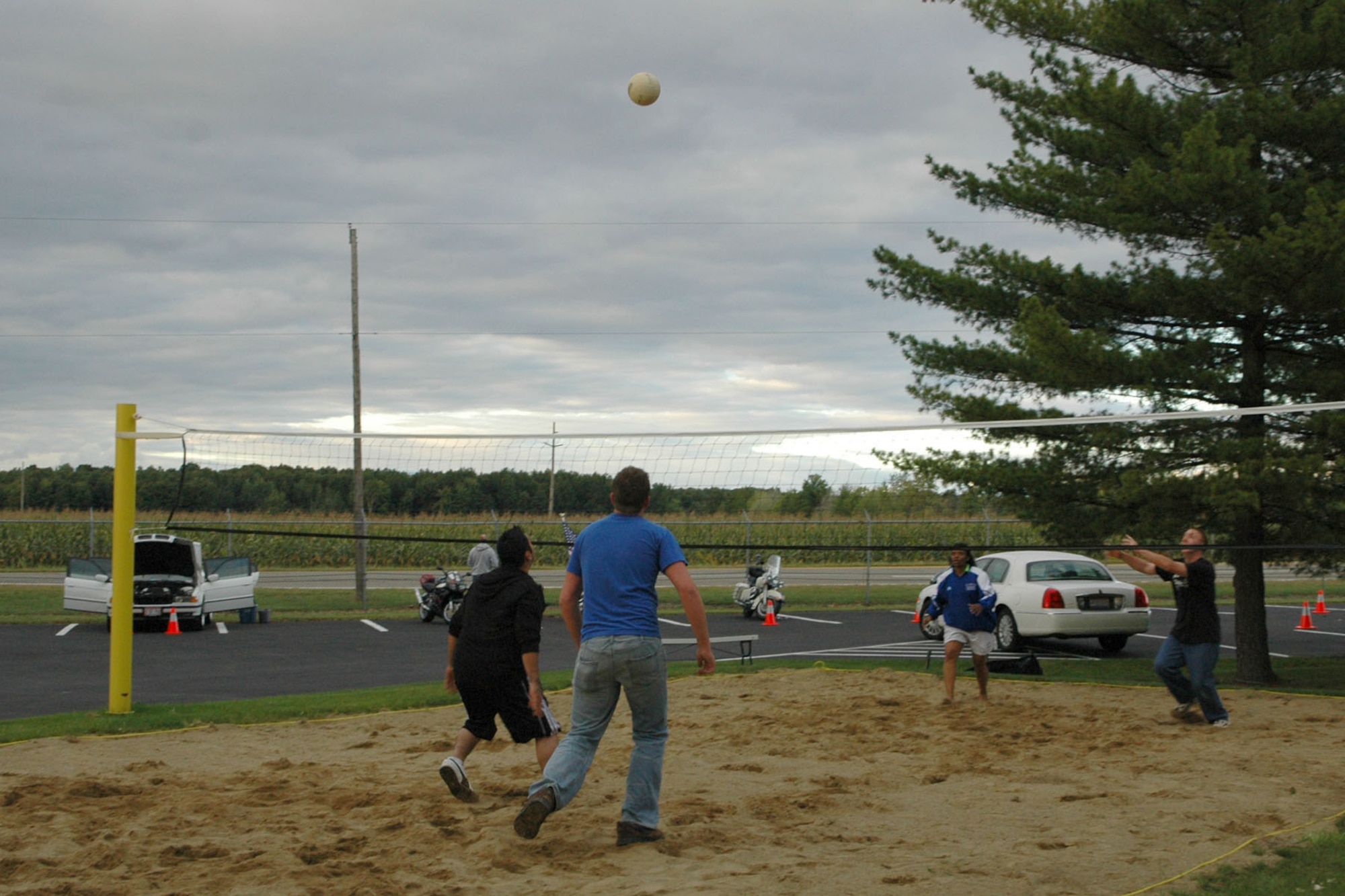YOUNGSTOWN AIR RESERVE STATION, Ohio — Air Force Reservists assigned to the 910th Airlift Wing participate in a sand volleyball game outside of the Eagle's Nest Club here during the club's Grand Re-Opening celebration . U.S. Air Force photo/ Tech. Sgt. Bob Barko Jr.