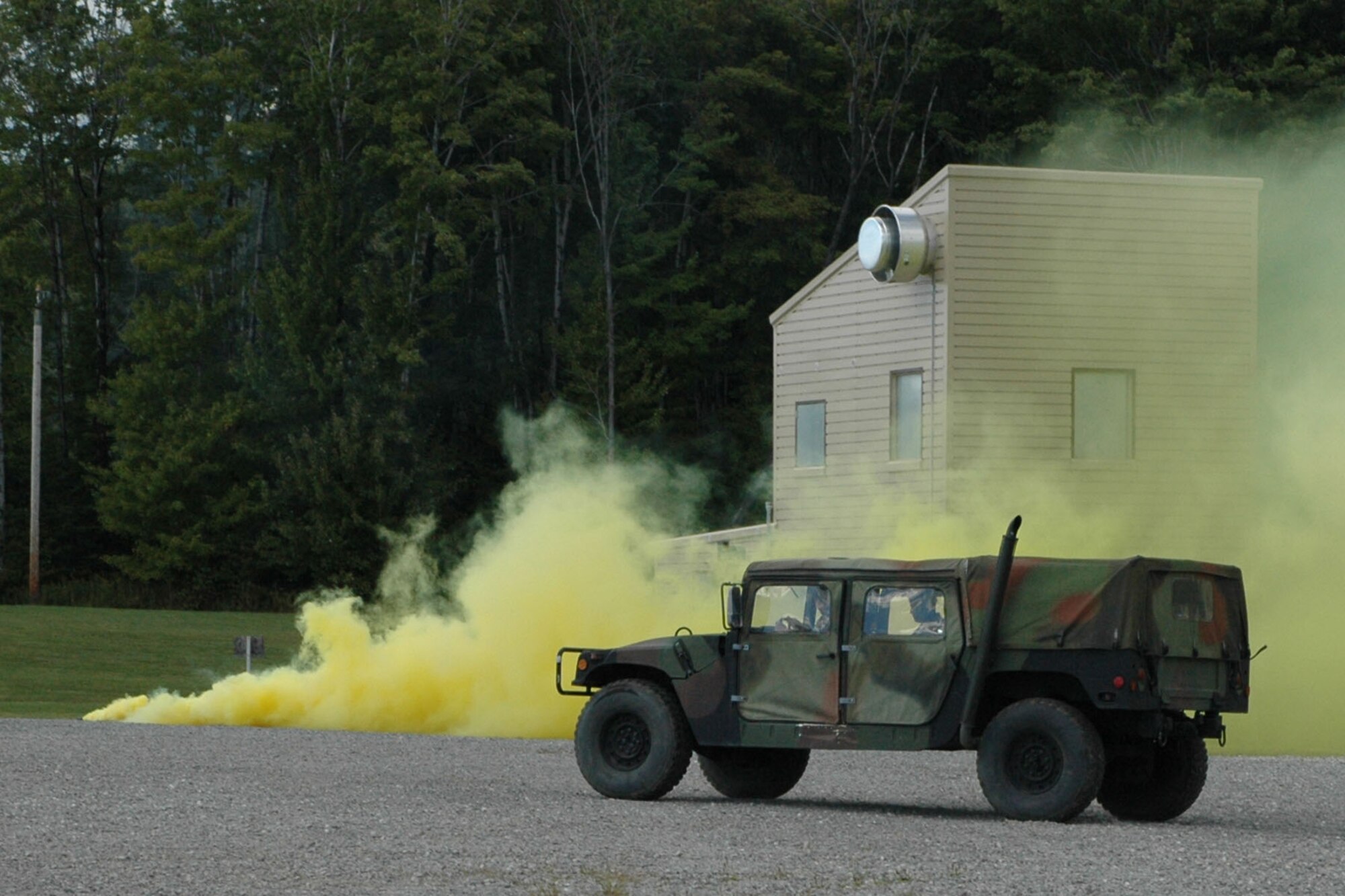 YOUNGSTOWN AIR RESERVE STATION, Ohio — Air Force Reservists assigned to a quick crisis repsonse team from the 910th Security Focres Squadron respond to a mock attack during a demonstration as the 910th hosted a group of 38 civilian employers here as part of annual Employer Awareness Day activities. Airmen assigned to the 910th nominated their civilian bosses to attend the event designed to celebrate civilian employers who aid the Air Force mission through support of their employees who are also Air Force Reservists assigned here. U.S. Air Force photo/ Tech. Sgt. Bob Barko Jr.