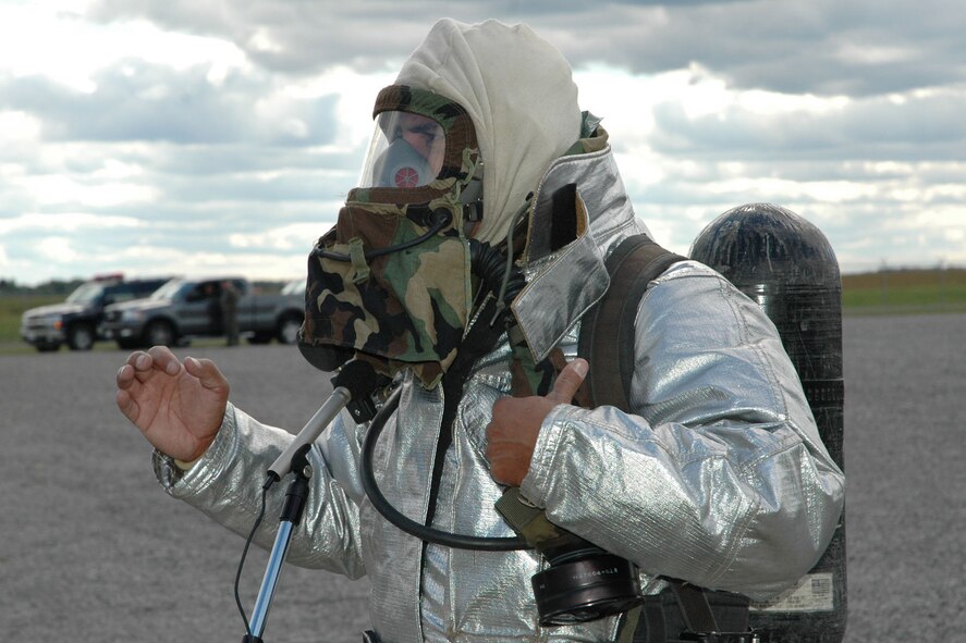 YOUNGSTOWN AIR RESERVE STATION, Ohio — Air Force Reserve Master Sgt. Elliot Rodriguez, a firefighter assigned to the 910th Civil Engineer Squadron addresses a group of employers while wearing his crash repsonse gear as the 910th hosted a group of 38 civilian employers here as part of annual Employer Awareness Day activities. Airmen assigned to the 910th nominated their civilian bosses to attend the event designed to celebrate civilian employers who aid the Air Force mission through support of their employees who are also Air Force Reservists assigned here. U.S. Air Force photo/ Tech. Sgt. Bob Barko Jr.