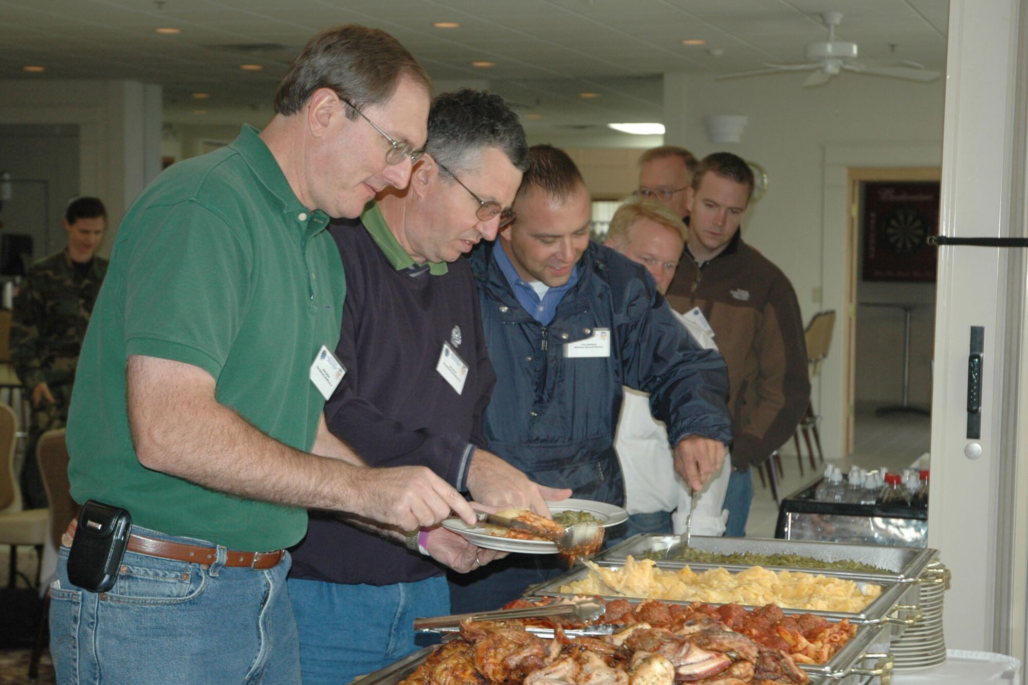 YOUNGSTOWN AIR RESERVE STATION, Ohio — Employers of Air Force Reservists assigned to the 910th Airlift Wing enjoy a buffet at the Eagle's Nest Club, provided by the Base-Community Council, here. The 910th hosted a group of 38 civilian employers at the base as part of annual Employer Awareness Day activities. Airmen assigned to the 910th nominated their civilian bosses to attend the event designed to celebrate civilian employers who aid the Air Force mission through support of their employees who are also Air Force Reservists assigned here. U.S. Air Force photo/ Tech. Sgt. Bob Barko Jr.