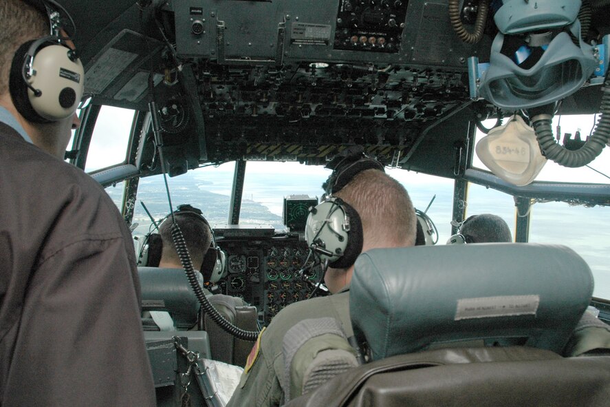 YOUNGSTOWN AIR RESERVE STATION, Ohio — An employer of an Air Force Reservist assigned to the 910th Airlift Wing takes in the activity on the flight deck of a C-130 based here during an orientation flight to the Niagara Falls area. The 910th hosted a group of 38 civilian employers at the base as part of annual Employer Awareness Day activities. Airmen assigned to the 910th nominated their civilian bosses to attend the event designed to celebrate civilian employers who aid the Air Force mission through support of their employees who are also Air Force Reservists assigned here. U.S. Air Force photo/ Tech. Sgt. Bob Barko Jr.