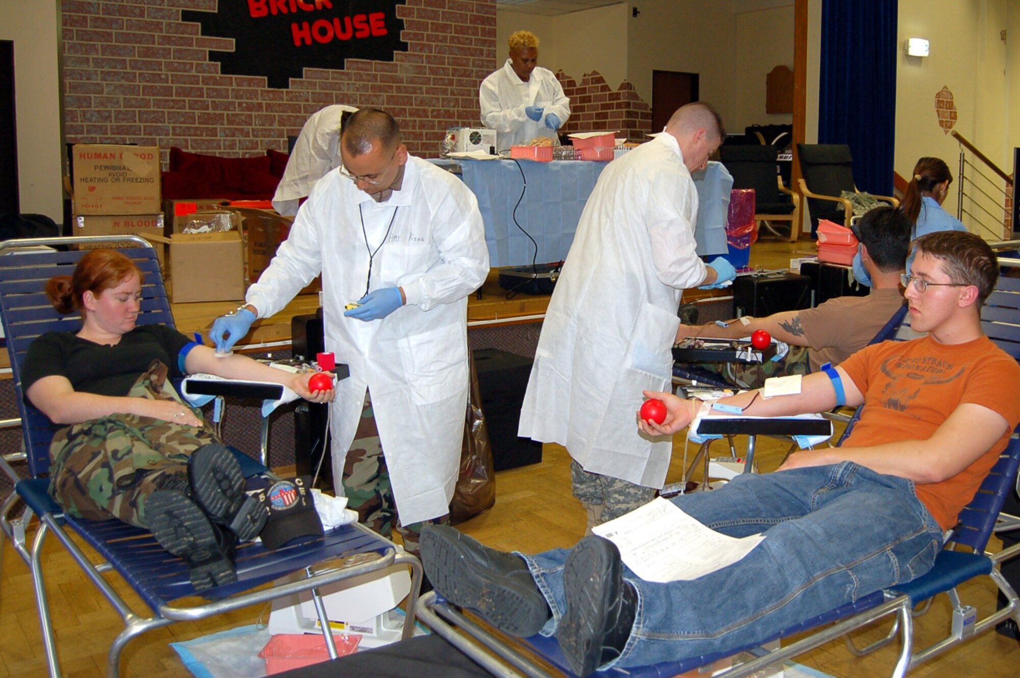 SPANGDAHLEM AIR BASE, Germany – Staff members from Landsthul Regional Medical Center draw blood during a base blood drive here Oct. 2. Sabers donated 64 units of blood during the drive. The next base blood drive is scheduled to take place during the upcoming holiday season. (U.S. Air Force photo/Staff Sgt. Tammie Moore)