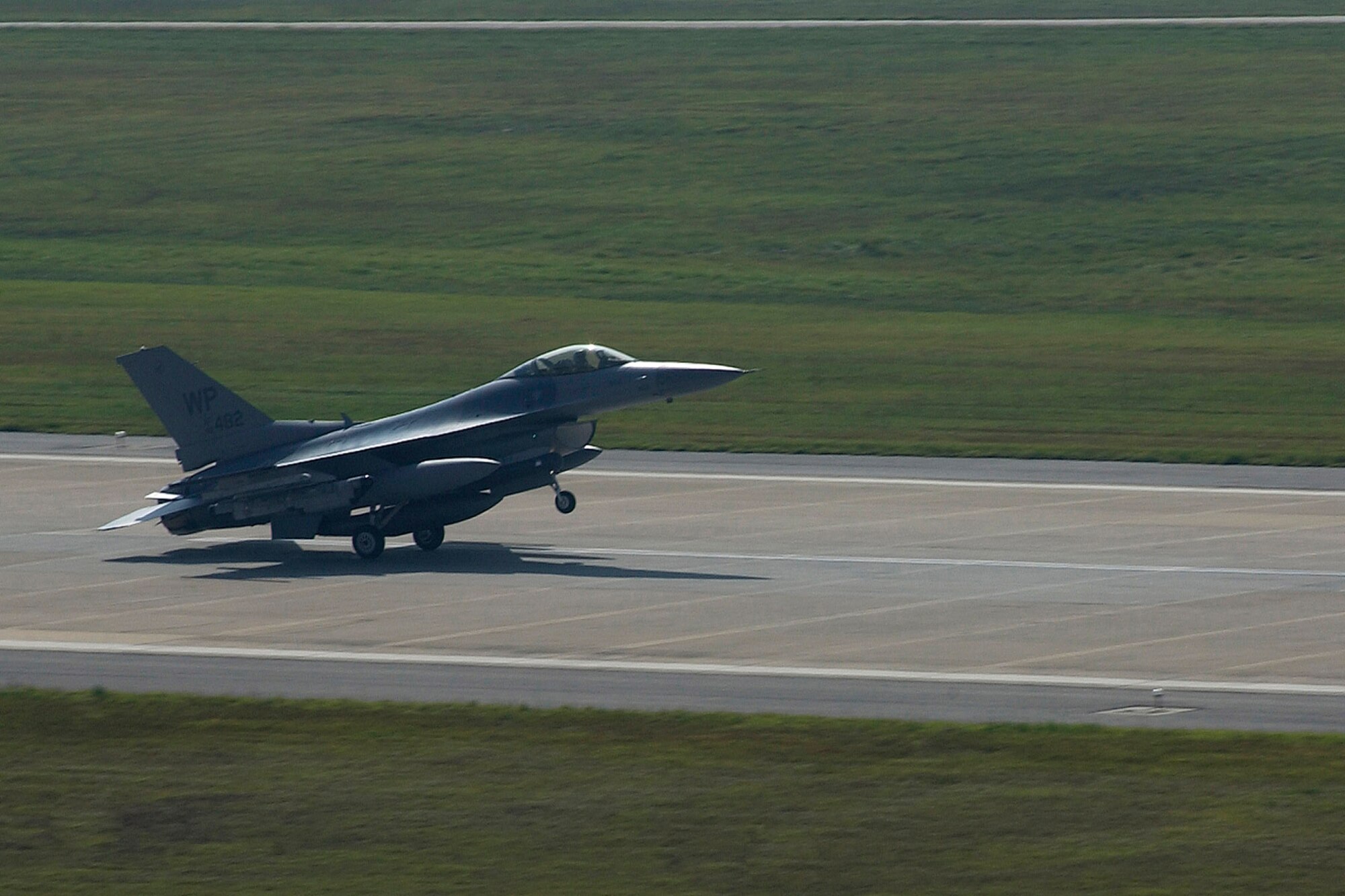 A new Block 40 F-16 Fighting Falcon arrives at Kunsan Air Base, South Korea, Oct. 2.  This was one of four upgraded fighters the 8th Fighter Wing received as part of the Common Configuration Implementation Program.  Four pilots from the 80th Fighter Squadron traveled to Eielson Air Force Base, Alaska, to fly the aircraft to Kunsan.  (U.S. Air Force photo/Senior Airman Giang Nguyen)