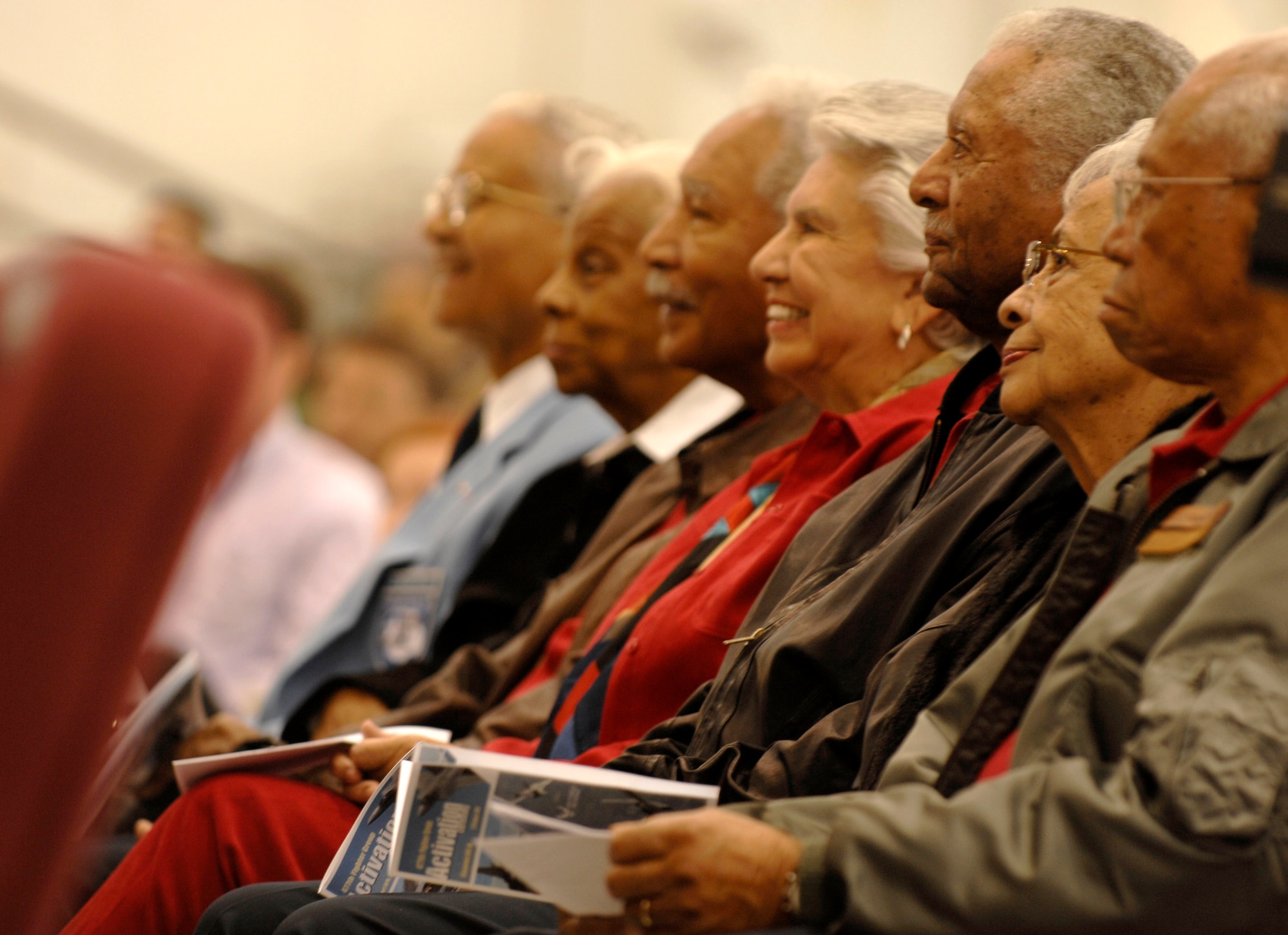 Several original Tuskegee Airmen and their spouses attended the 477th Fighter Group activation ceremony Oct. 2 at Elmendorf Air Force Base, Alaska. These famous African-American aviators are known for their unrivaled combat skills, earing two Presidential Unit citations during World War II. The 477th FG's heritage is rooted in the 477th Bombardment Group, a Tuskegee Airmen unit from the 1940s. The newly designated unit is the only Reserve F-22 Raptor unit in the Air Force. (U.S. Air Force photo/Senior Airman Garrett Hothan)