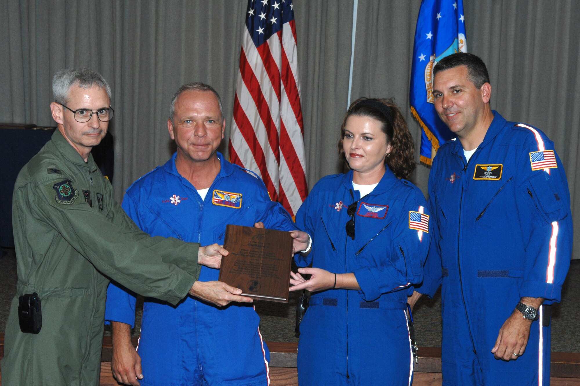 The 20th Special Operations Squadron presented a plaque to the paramedic team that came to the 20th Special Operations Squadrons aide during a recent MH-53 Pave Low accident, Hurlburt Field, Sept 28, 2007. The team was invited to the 20th SOS to be honored and sincerely thanked for their timeliness and accuracy.  
(USAF photo by Senior Airman Stephanie Jacobs) (Released)
