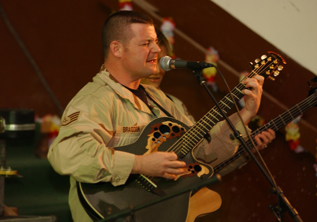 SSgt Dan Bragdon, guitar player with the USAF Heartland of America Band's popular music group, Night Wing, performed for deployed troops in Iraq.