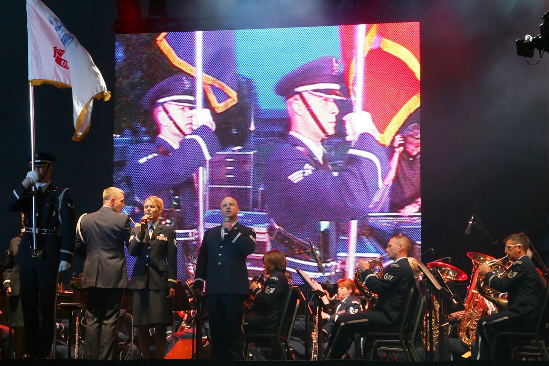 The USAF Heartland of America Band honors members of all branches of military service by playing each service song. This performance was part of the multi-media presentation of the 55th Wing's military Tattoo, "The Call of Freedom," in October 2006. 