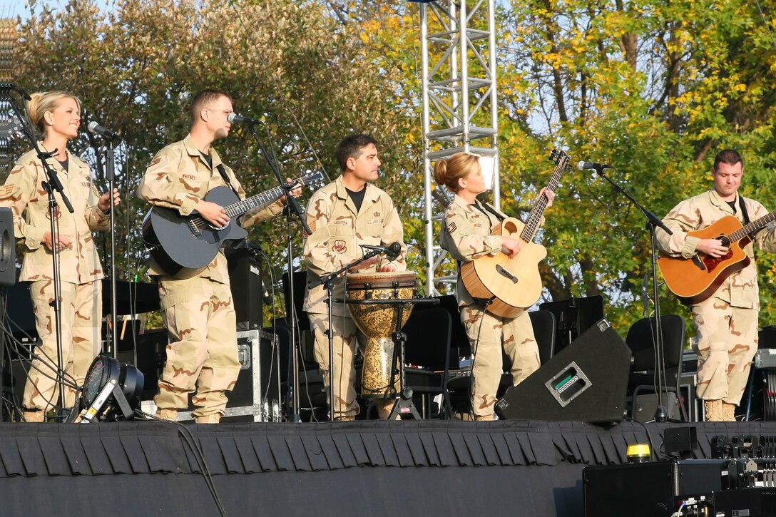 Members of Night Wing, the popular music group from the USAF Heartland of America Band, performed their accoustic show for the opening of the military Tattoo, "The Call of Freedom," in October 2006.