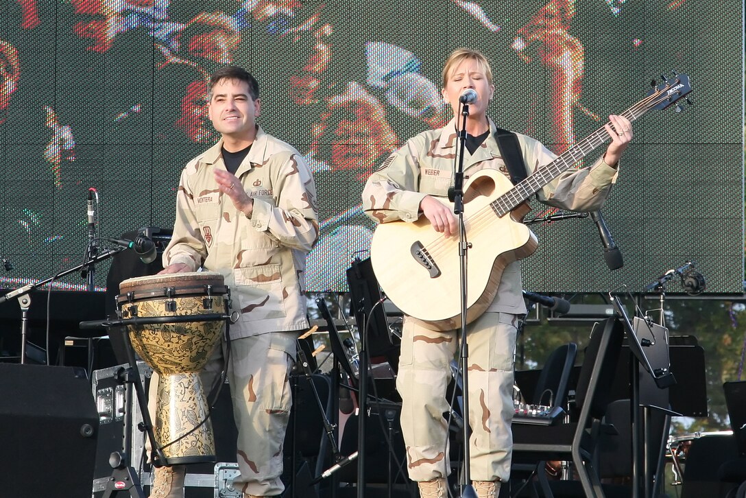 MSgt Douglas Montera & TSgt Lori Weber performed with Night Wing, the popular music group from the USAF Heartland of America Band, for the opening of the military Tattoo, "The Call of Freedom," in October 2006.