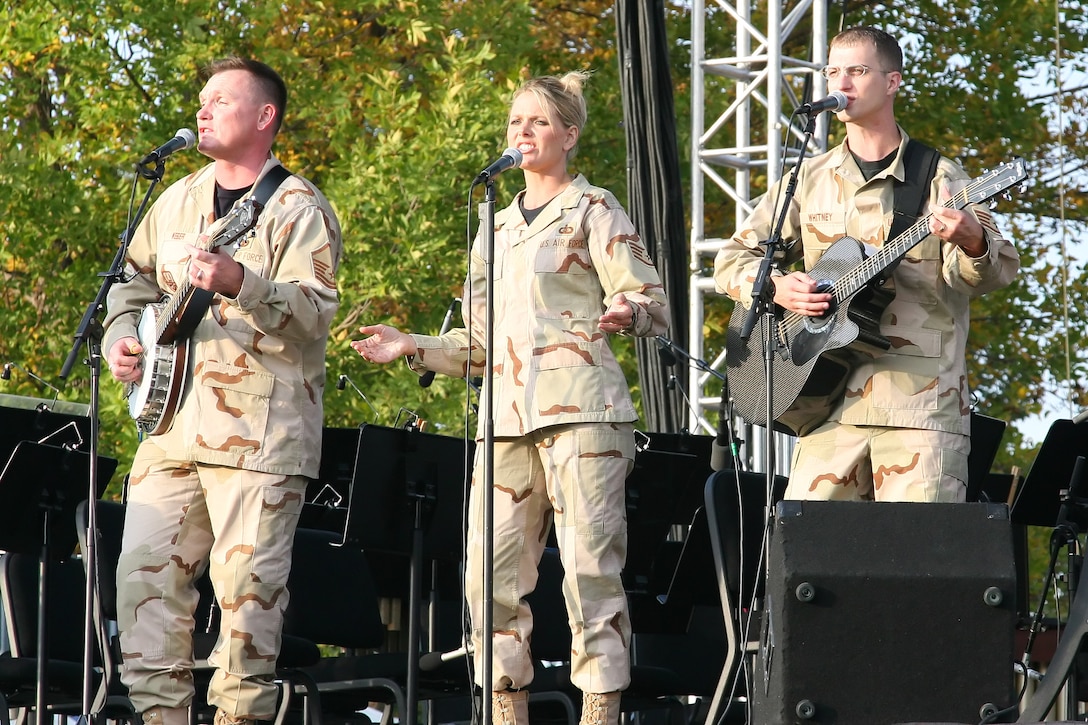 MSgt Jimmy Weber, TSgt Lara Murdzia and SSgt Clint Whitney perform with the popular music group, Night Wing, from the USAF Heartland of America Band.  Their performance was part of the military Tattoo, "The Call of Freedom," in October 2006.