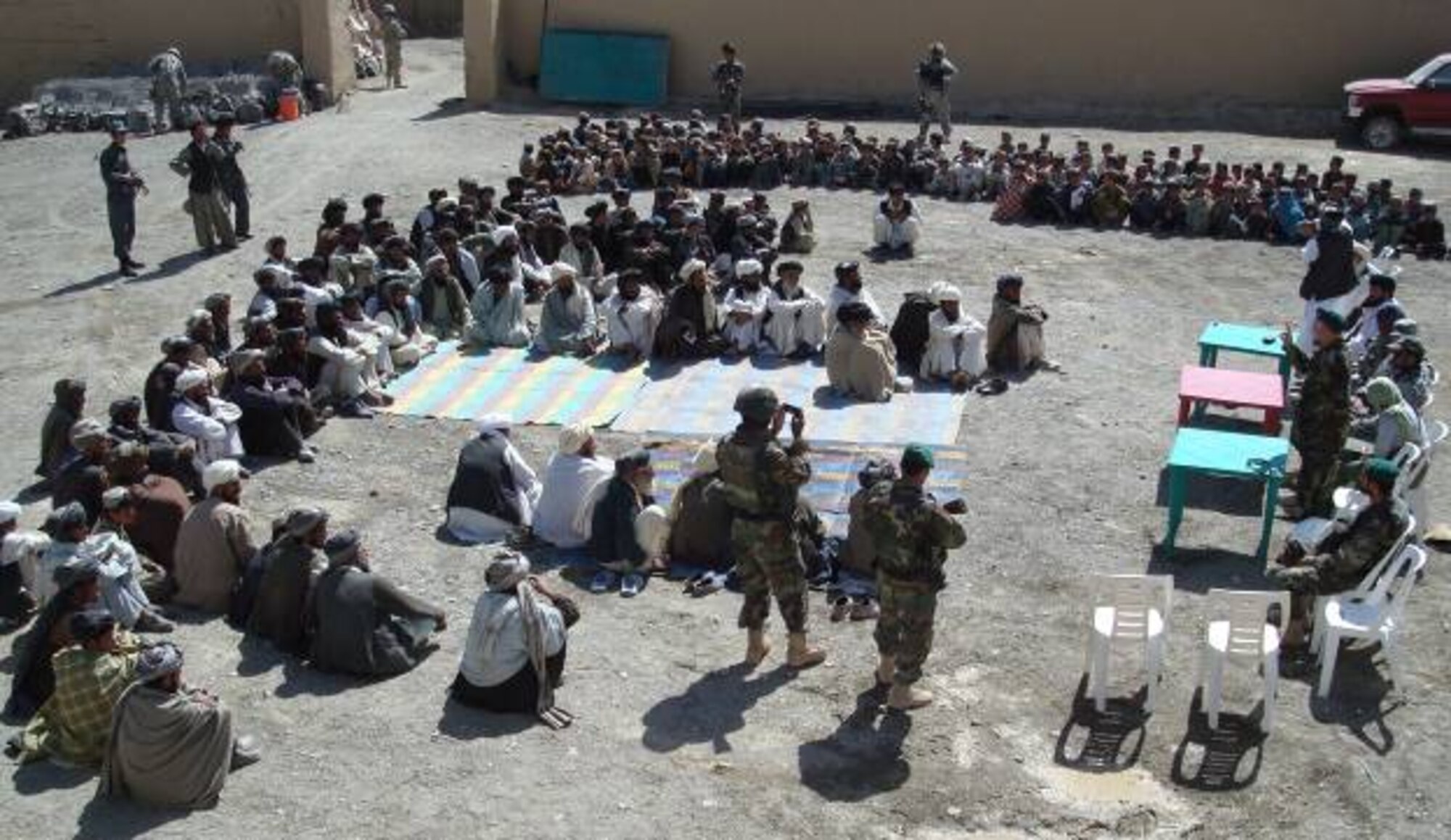 More than 125 men and boys attend a provincial-level shura, or meeting, here Oct. 2.  Although the shura was facilitated by Provincial Reconstruction Team Qalat—a joint U.S. Air Force and Army unit stationed in the country since April—the meeting was strictly an Afghan affair.  Topics discussed included security, governance and reconstruction in this remote southern region of the country.