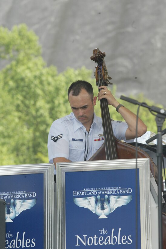 Airman 1st Class David Beasley, bass player with The Noteables jazz ensemble, performs for crowds numbering in the tens of thousands at Stone Mountain, Georgia over Memorial Day.  Airman Beasley is also the USAF Heartland of America Band's staff arranger.