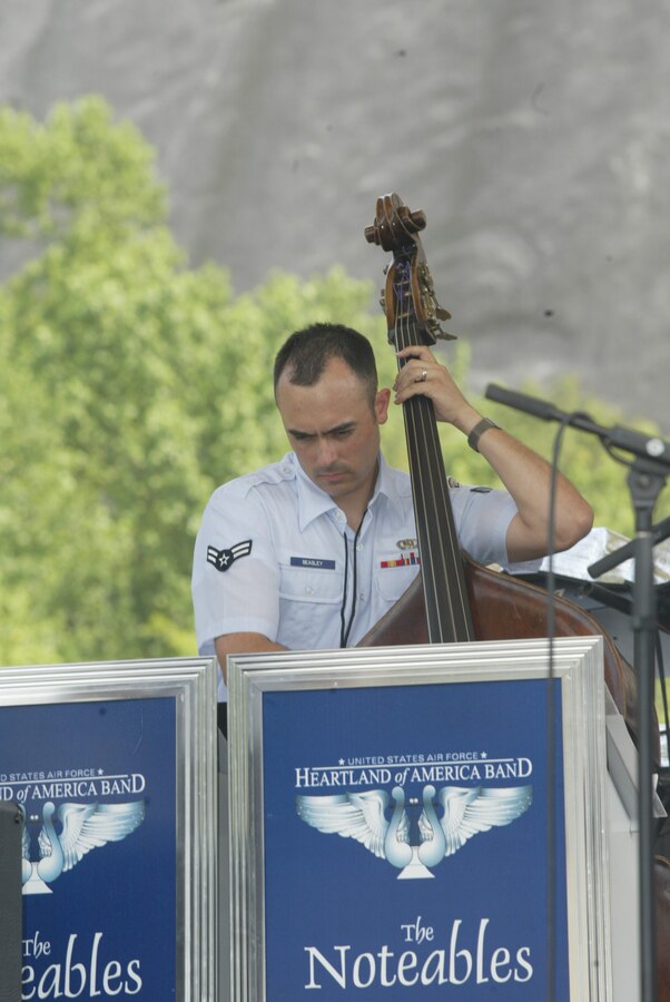 Airman 1st Class David Beasley, bass player with The Noteables jazz ensemble, performs for crowds numbering in the tens of thousands at Stone Mountain, Georgia over Memorial Day.  Airman Beasley is also the USAF Heartland of America Band's staff arranger.