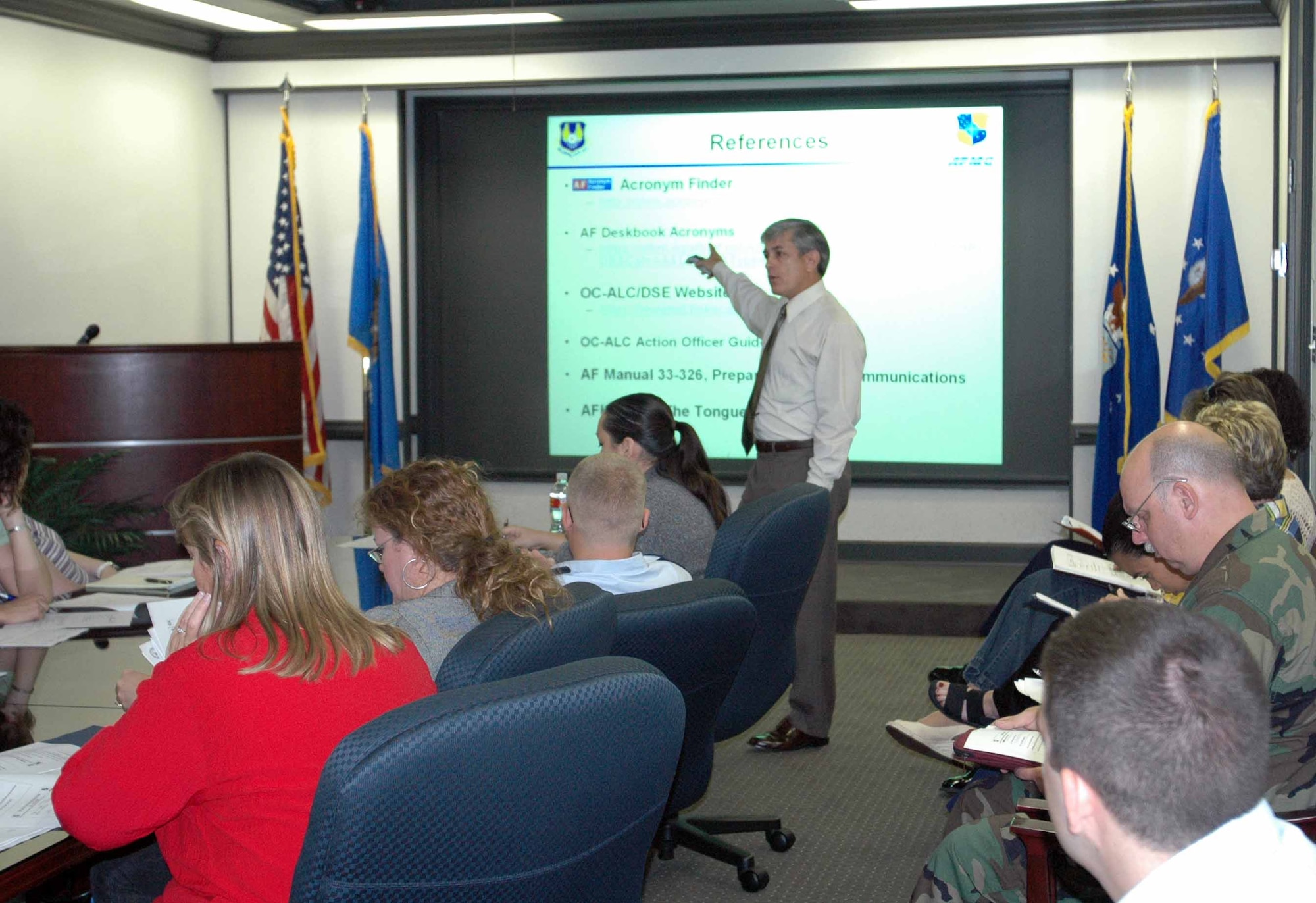 Bob Sandlin, 72nd Air Base Wing executive officer, outlines references to properly format official documents in an hour long administrative training class Sept. 28. (Air Force photo by Kandis West)