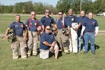 Arnold Engineering Development Team from left to right, Lee Brassfield, Charlie Armstrong, Clint Montgomery, Jay Spry, Daryle Lopes, Wade Campbell and Pat Eagan. Front, George Chambers. (Photo by Rick Goodfriend)