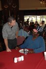Gary Casteel listens to a veteran share a story. 