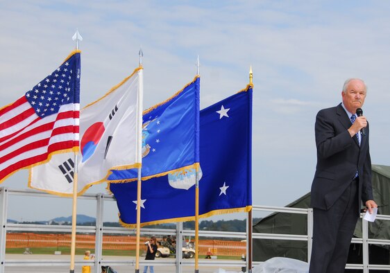 OSAN AIR BASE, Republic of Korea -- Secretary of the Air Force Michael W. Wynne addresses the crowd in opening ceremonies here for Air Power Day, Osan's annual air power demonstration. (Air Force photo by Staff Sgt Ronnie Hill)
