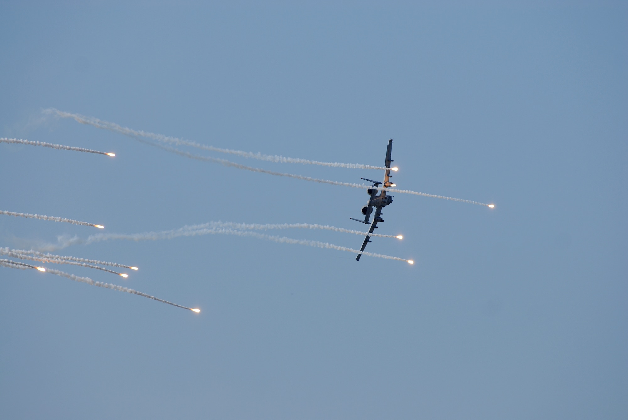 OSAN AIR BASE, Republic of Korea --  An  A-10 Thunder Bolt II drops flares during a Comabat Search and Rescue demonstration during Air Power Day 2007 on Oct. 6 here. (U.S. Air Force photo by Airman 1st Class Chad Strohmeyer)