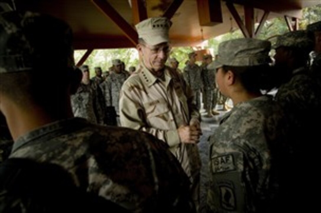 U.S. Navy Adm. Mike Mullen, chairman of the Joint Chiefs of Staff, greets U.S troops assigned to Provincial Reconstruction Team 236 in Jalalabad, Afghanistan, Oct. 5, 2007.  